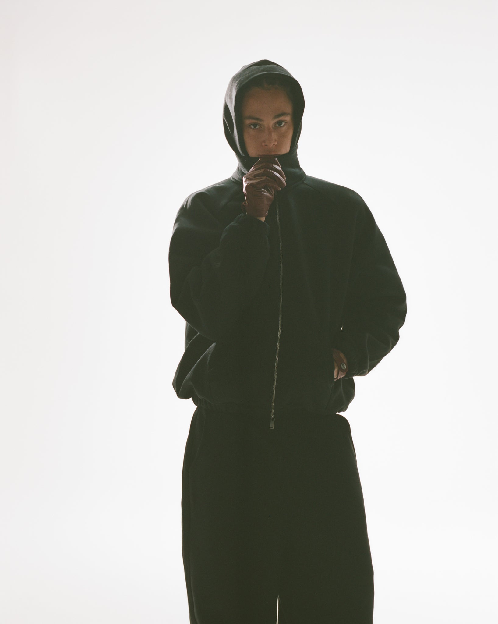 Black Cozy Track Jacket by Sweats EU, featuring a comfortable fit and stylish design, displayed on a model.