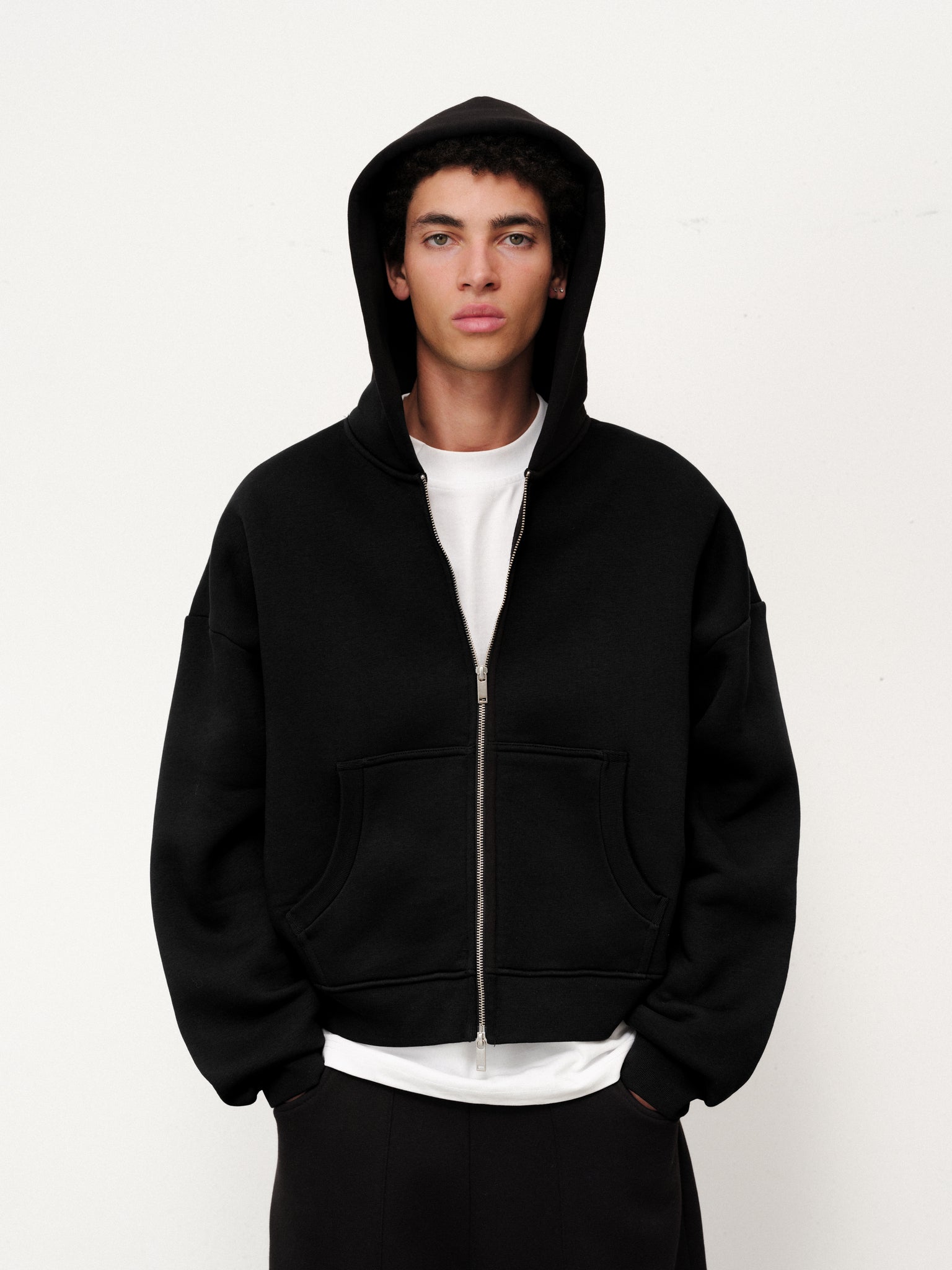 Black Cozy Zip Up hoodie by Sweats EU, front view showing the full zip closure and comfortable fit.
