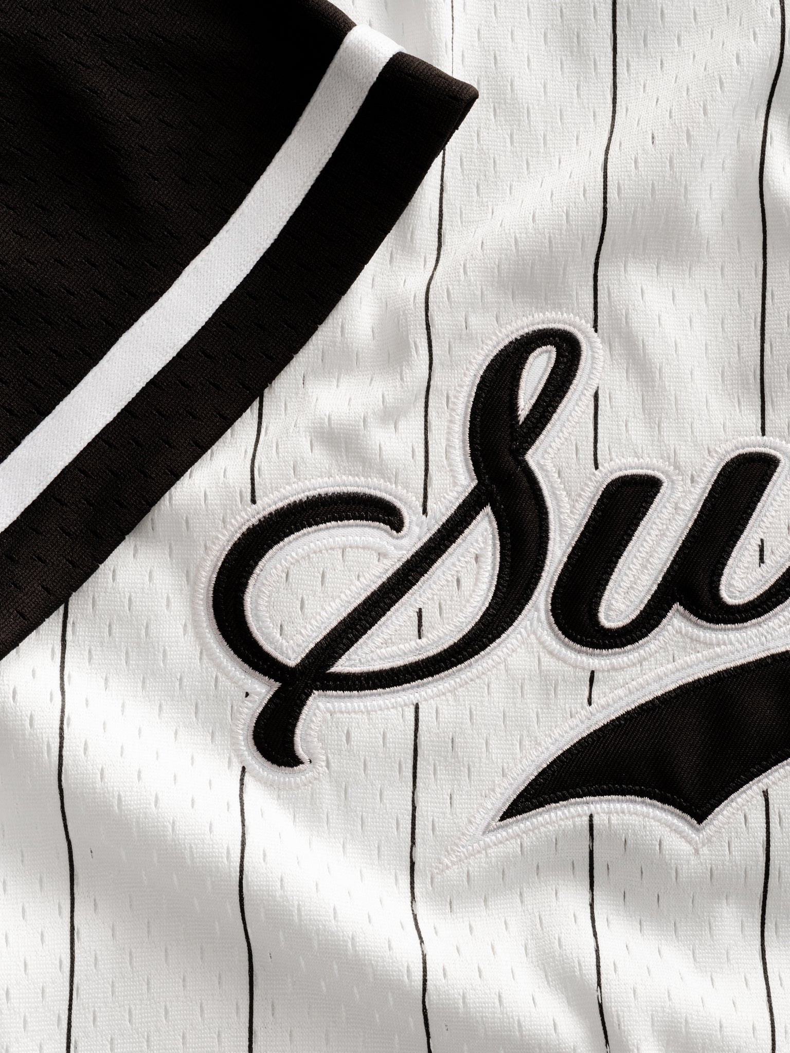 Pinstripe baseball jersey by SWEATS EU displayed flat, showcasing its classic design and fabric details.
