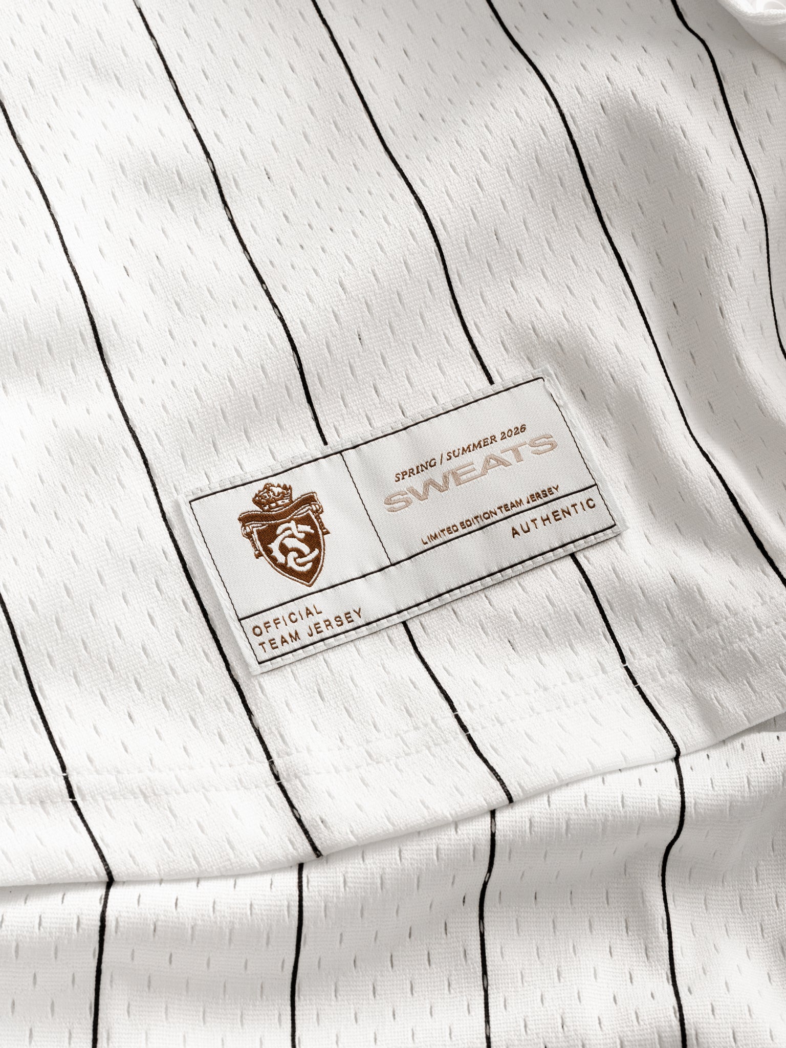 Pinstripe baseball jersey by SWEATS EU displayed flat, showing the classic design and details of the sporty, stylish apparel.
