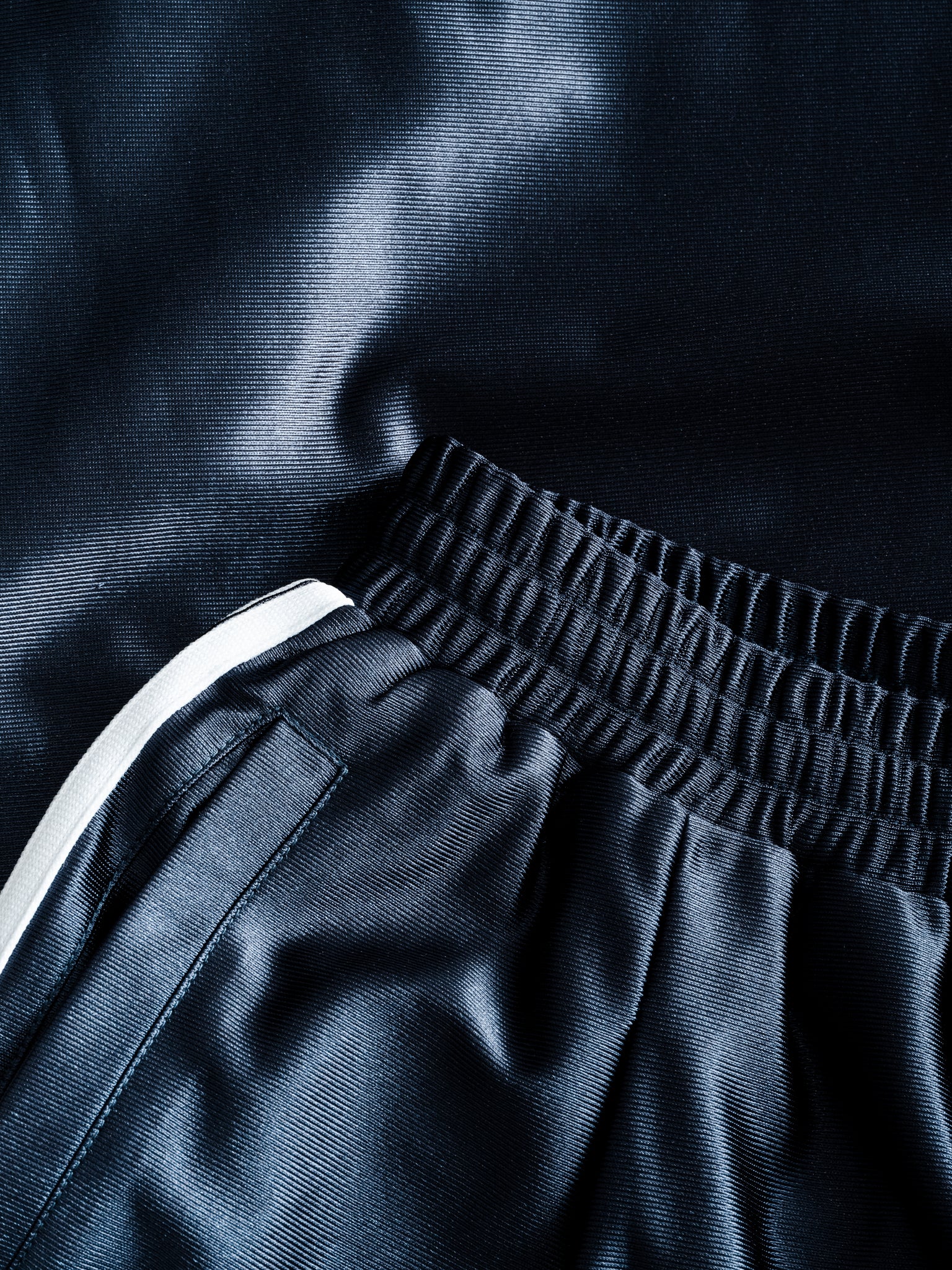 Navy League Shorts by SWEATS EU laid flat, showing the casual fit, soft fabric, and adjustable waistband for comfortable wear.