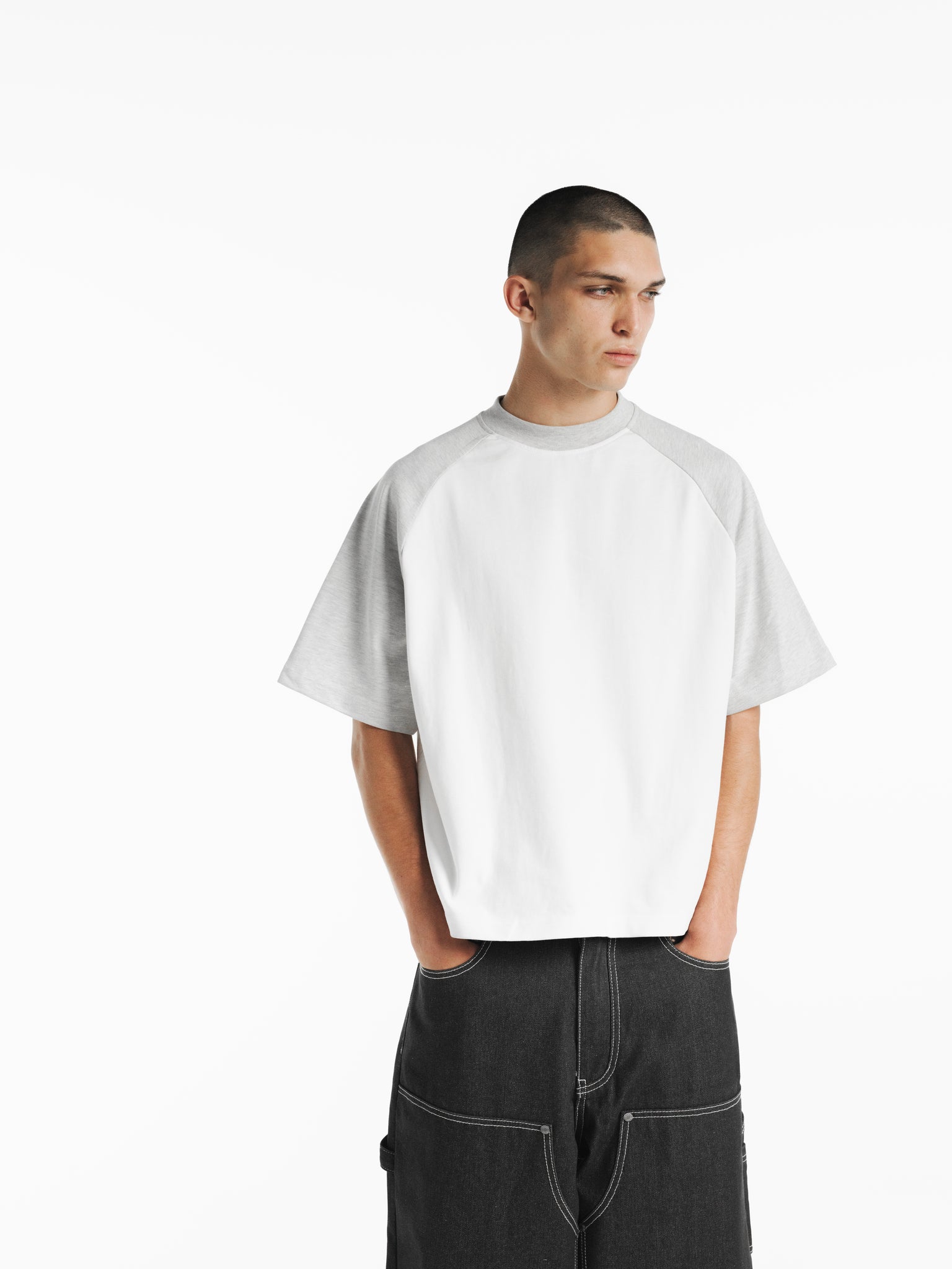 White and Arctic raglan short-sleeve T-shirt by SWEATS EU, featuring contrasting sleeves and casual fit.