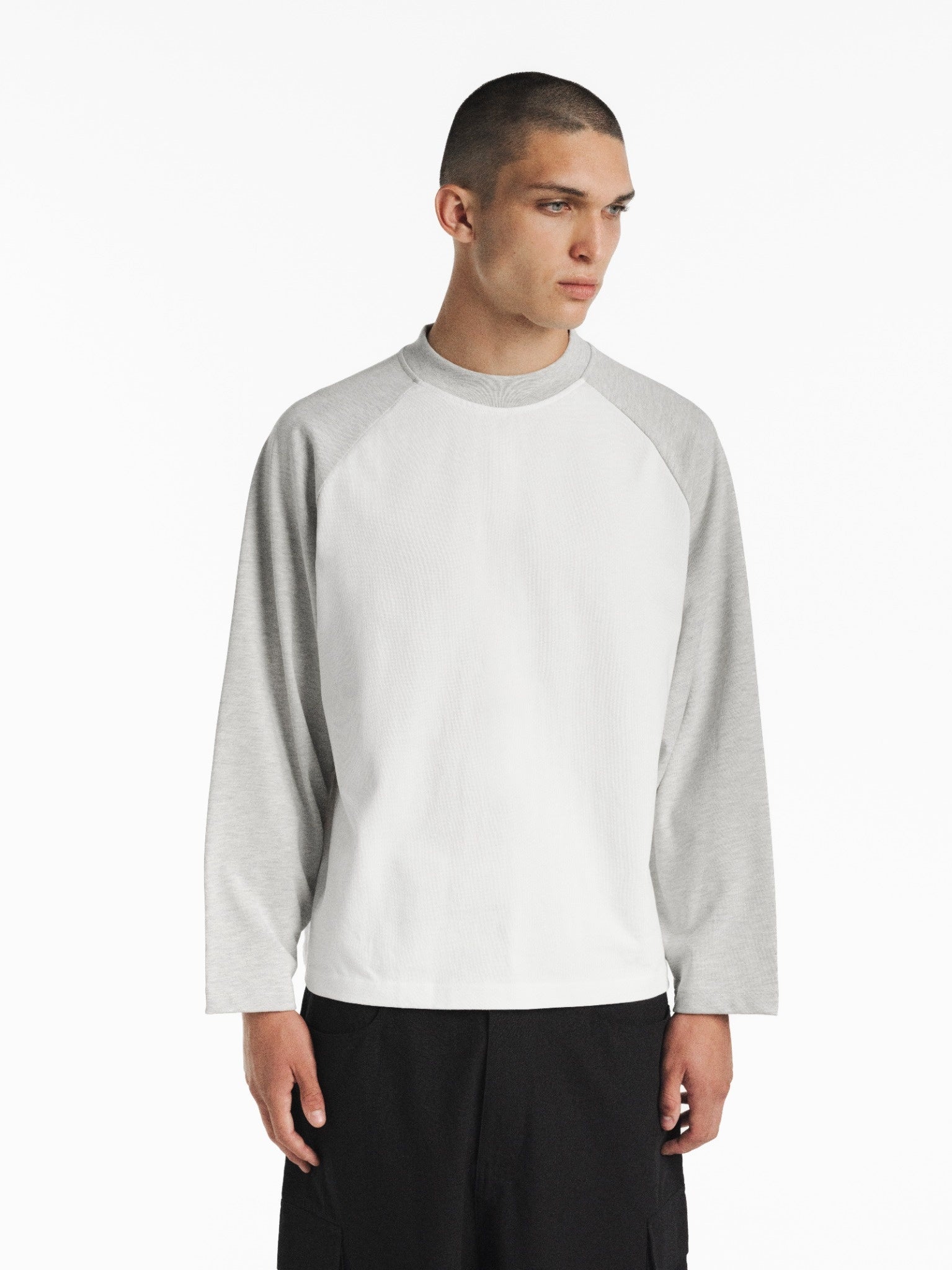 White and Arctic blue raglan long-sleeve t-shirt by SWEATS EU, featuring a casual fit and contrasting color sleeves.