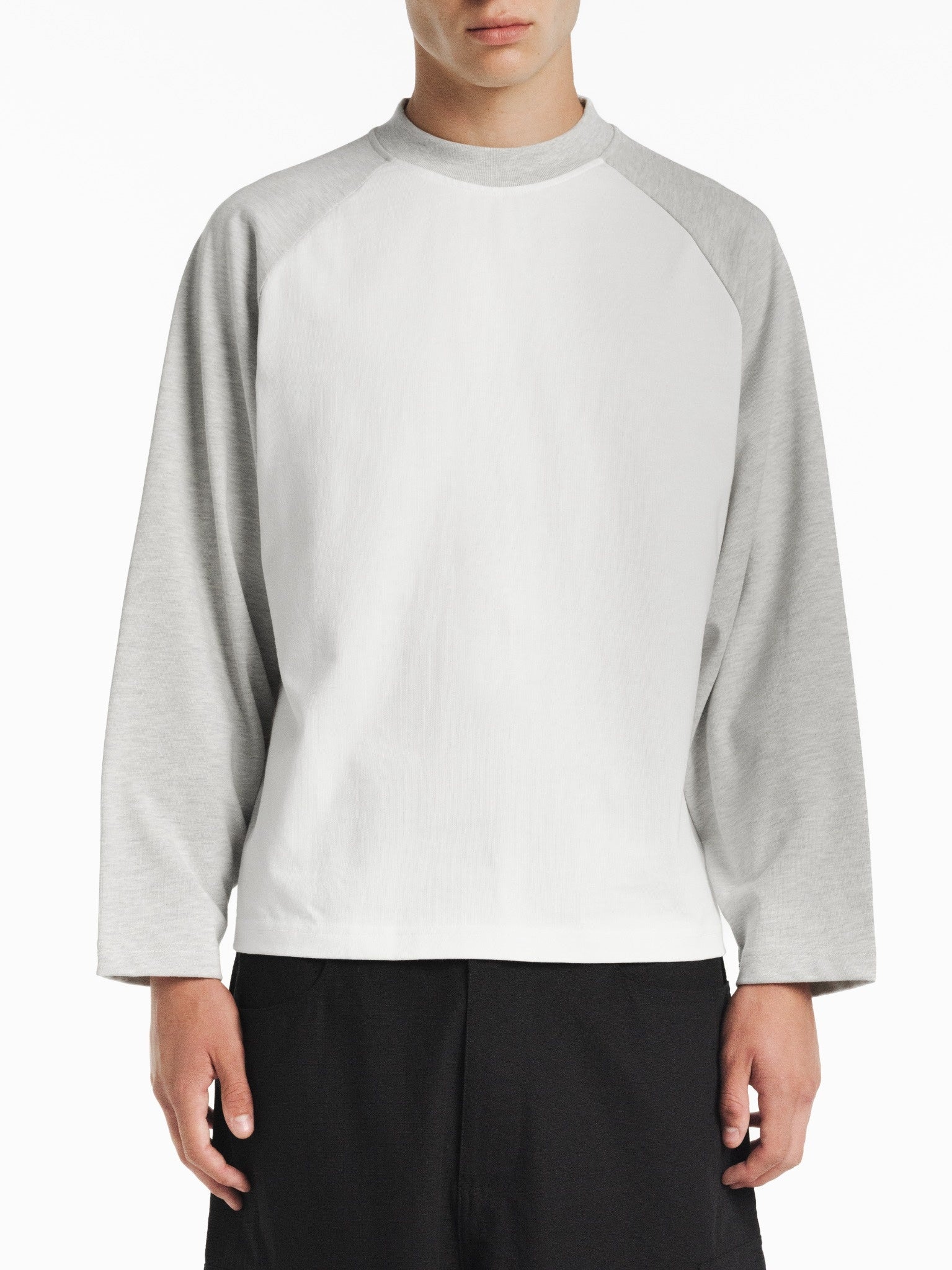 White and Arctic blue raglan long sleeve T-shirt from SWEATS EU featuring contrasting color sleeves and a casual fit.