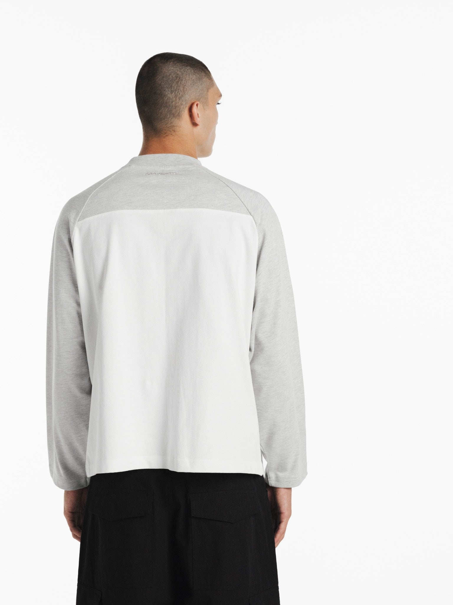 White and Arctic blue raglan long-sleeve T-shirt by SWEATS EU, featuring a casual fit and contrasting sleeve colors.