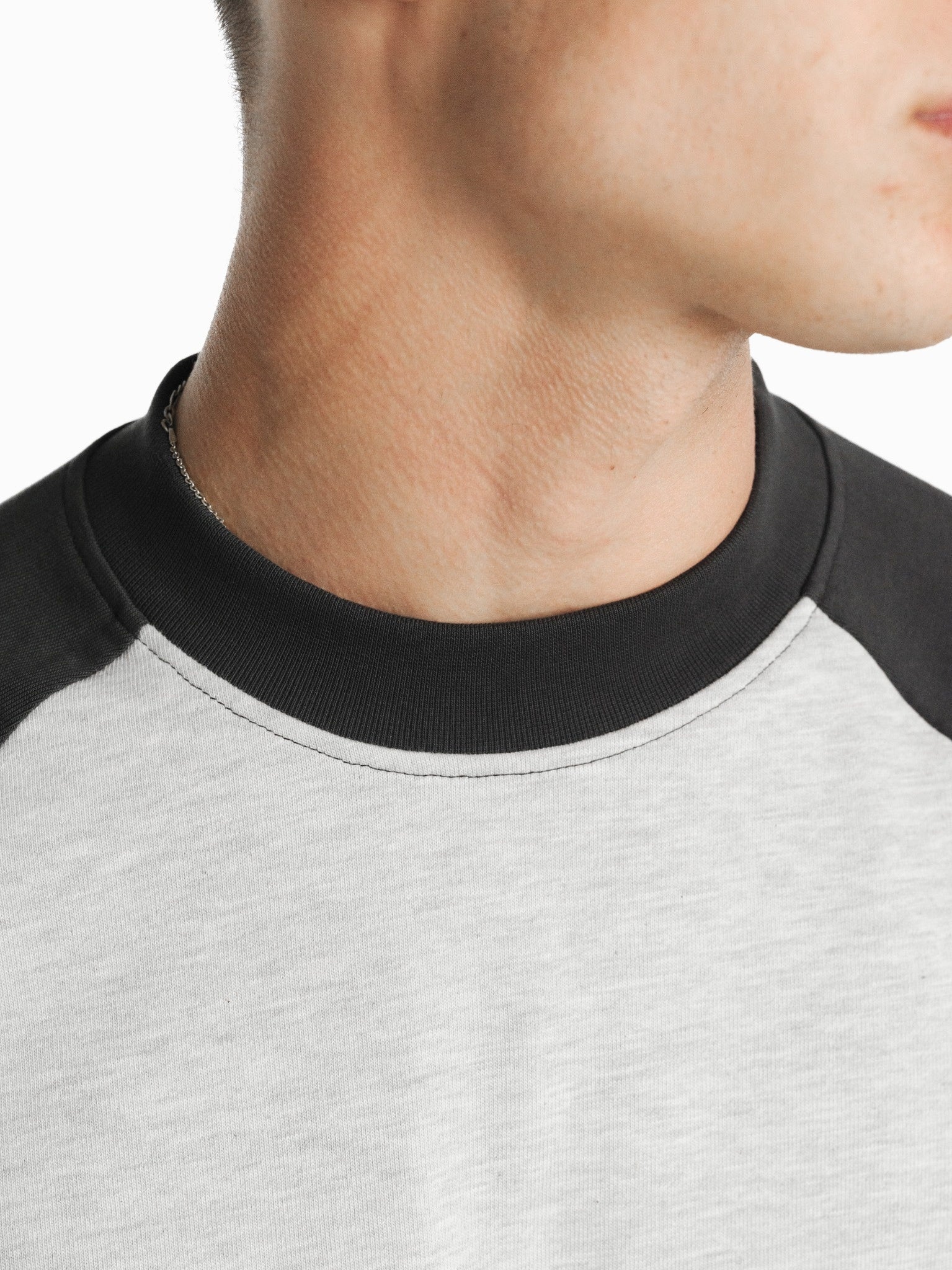 Long sleeve raglan t-shirt by SWEATS EU in Arctic/Granite color, featuring contrasting sleeves and a casual fit.