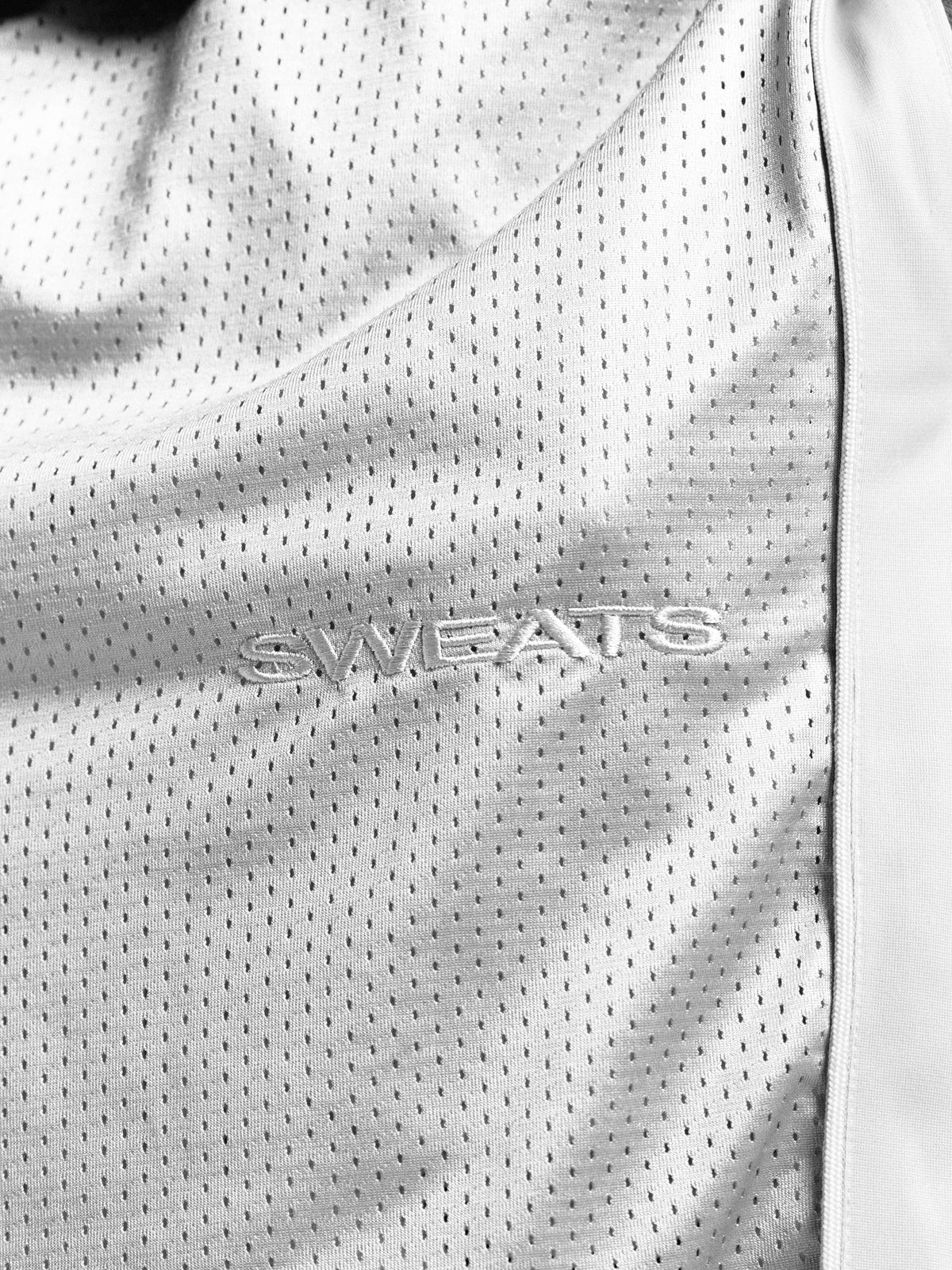 Grey mesh shorts by SWEATS EU, featuring breathable fabric and casual fit, ideal for athletic or everyday wear.