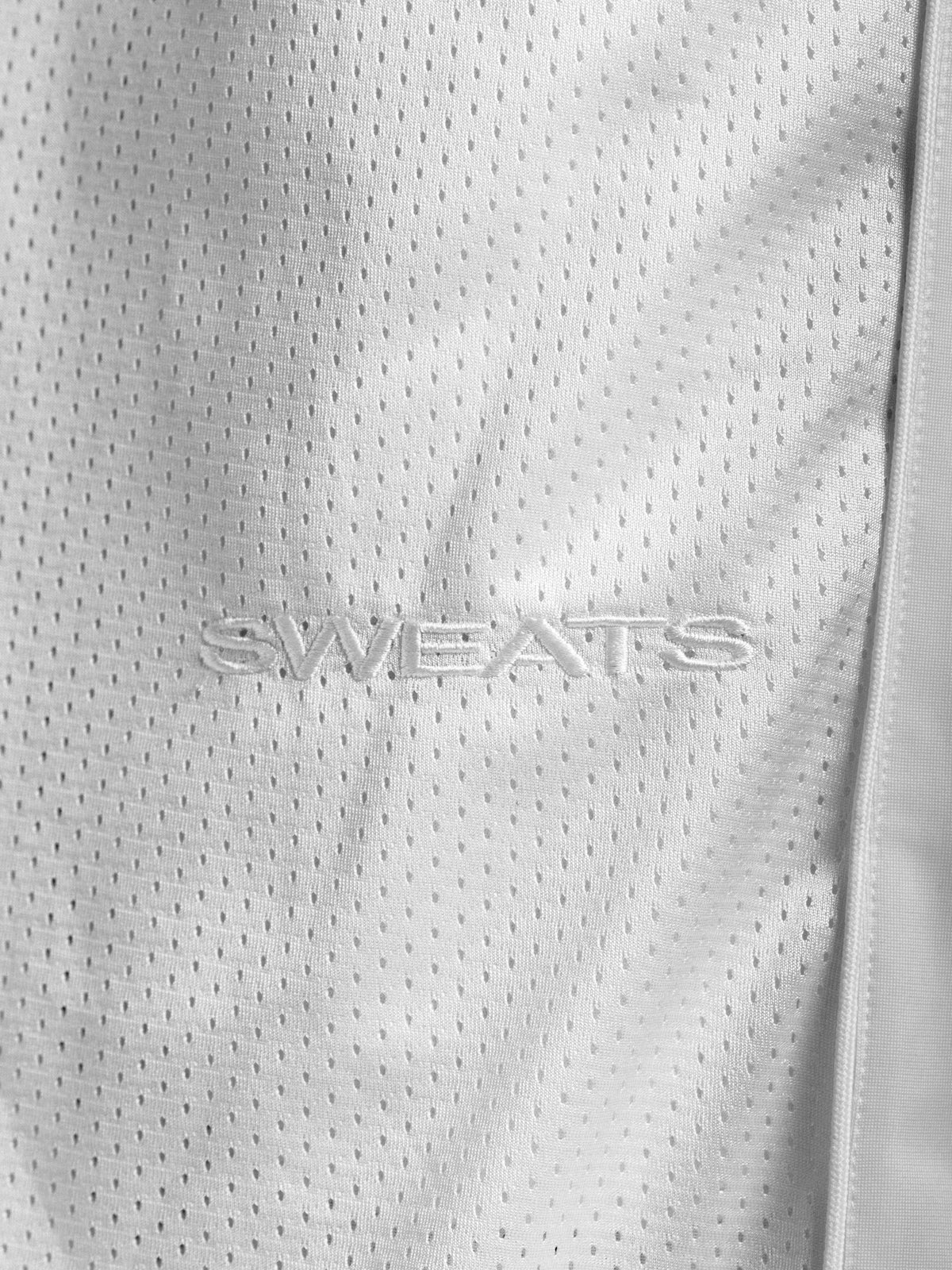 White mesh shorts by SWEATS EU featuring lightweight breathable fabric and a relaxed fit for casual wear.
