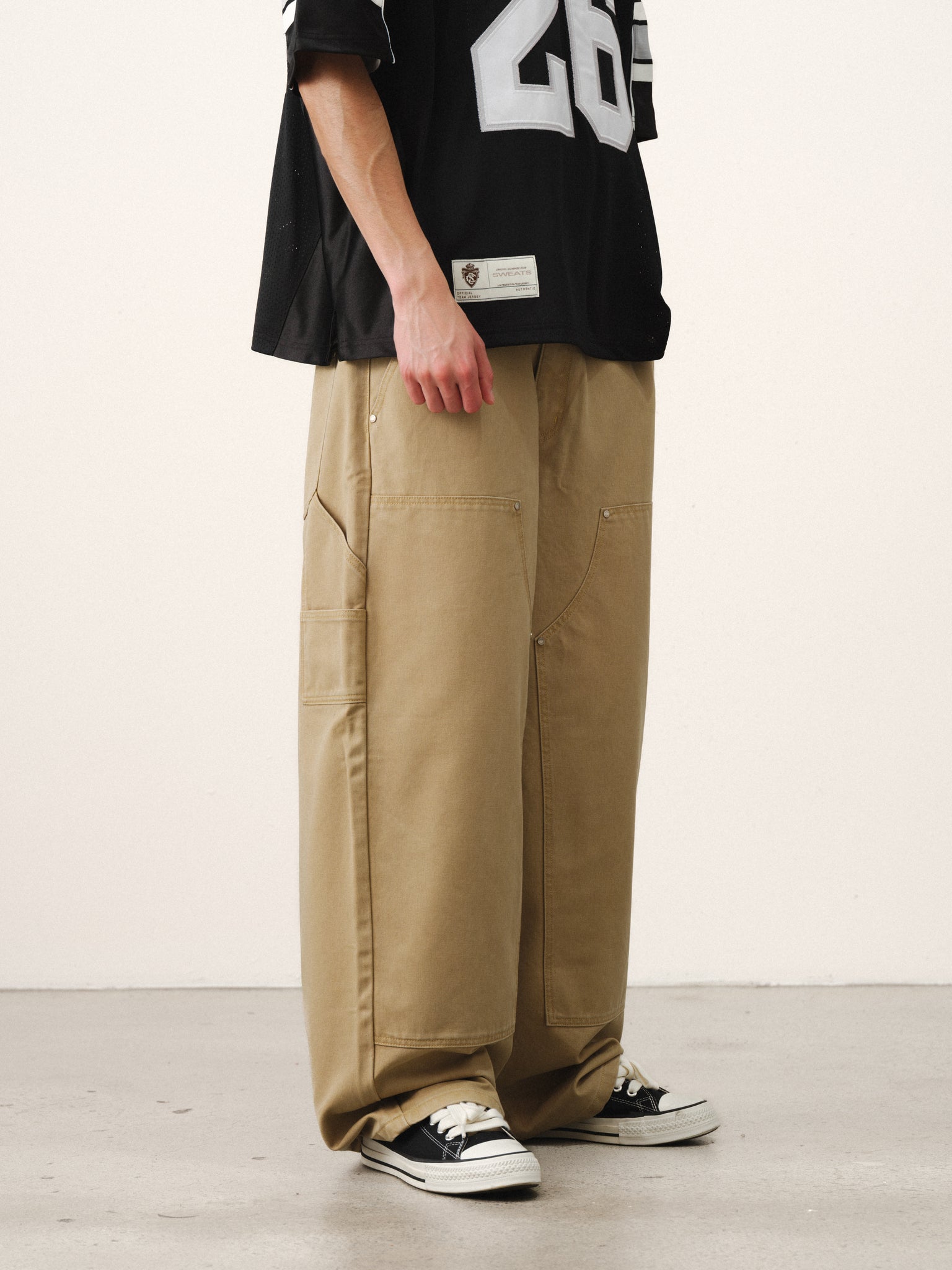 Sand-colored double knee pants by SWEATS EU, featuring a casual fit and durable fabric, shown in this product image.