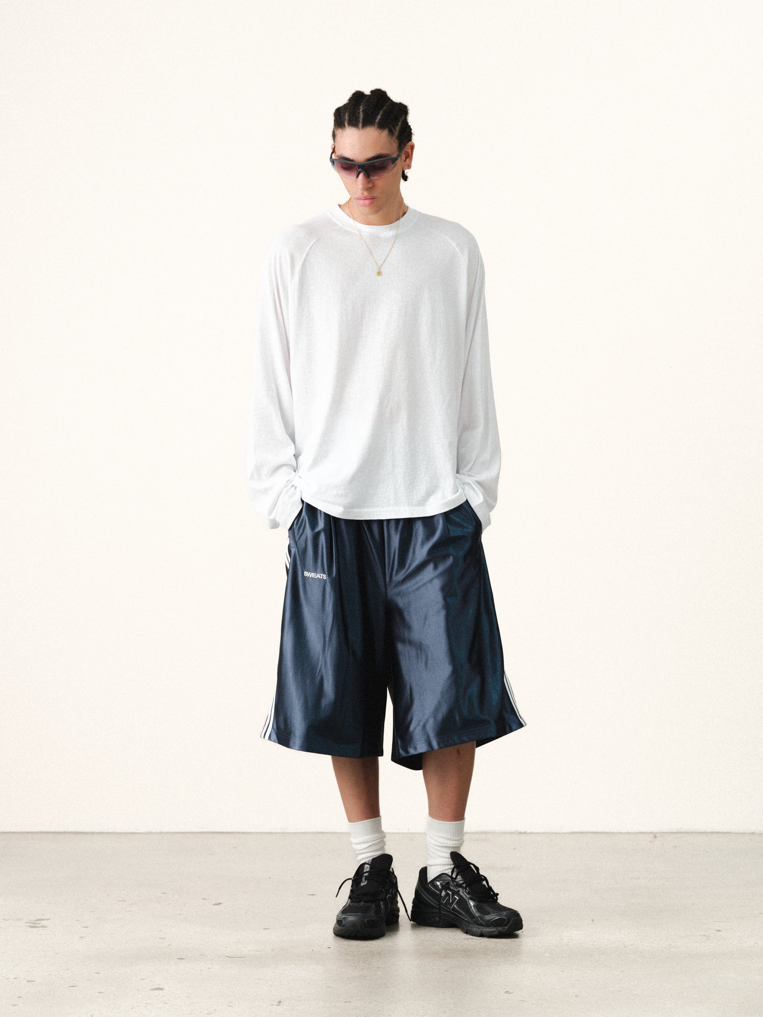 Navy League shorts by SWEATS EU, lightweight athletic shorts with a relaxed fit and elastic waistband, suitable for summer activities.