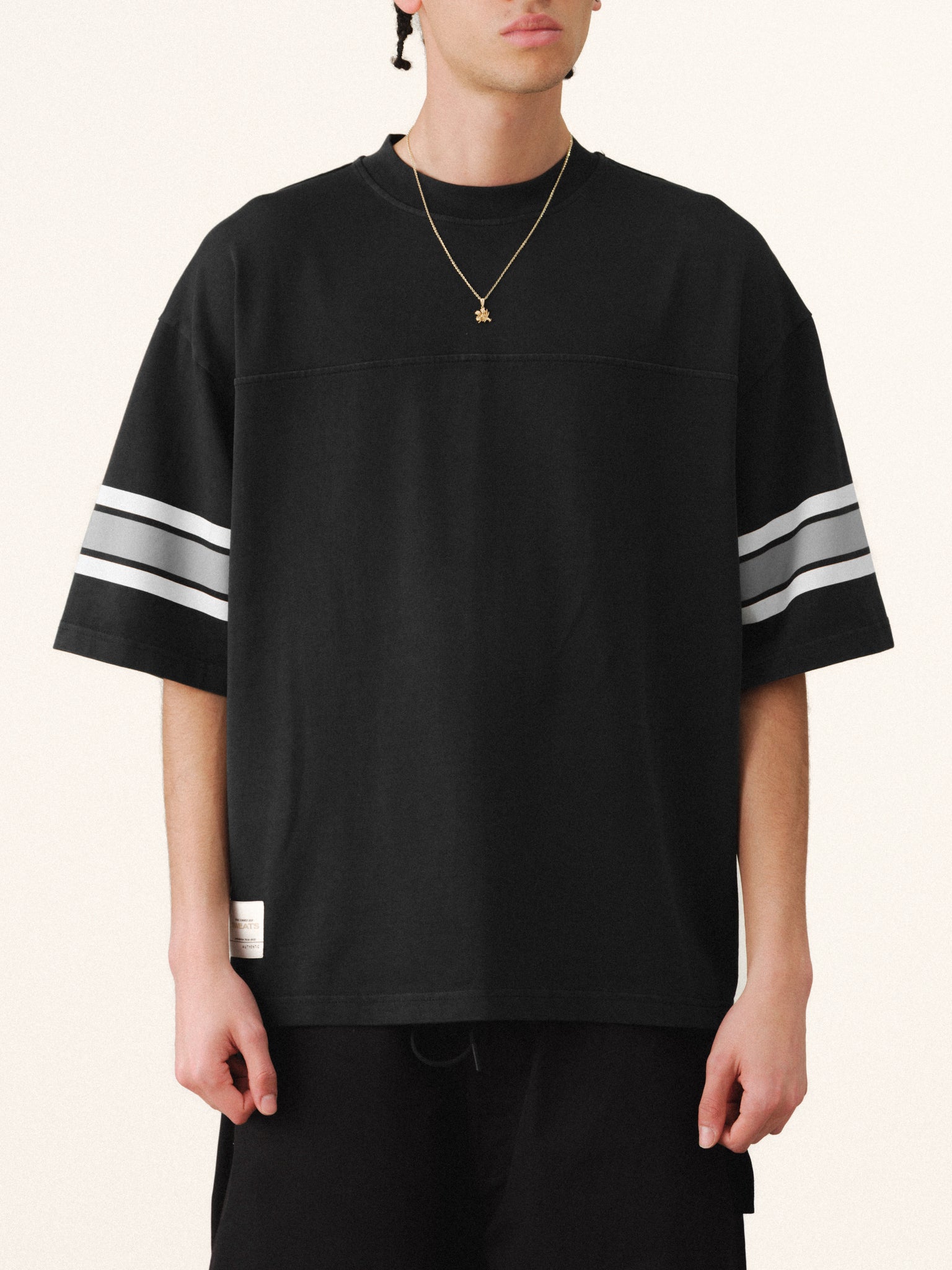Washed black short-sleeve jersey T-shirt by SWEATS EU, casual fit, displayed flat on a white background.