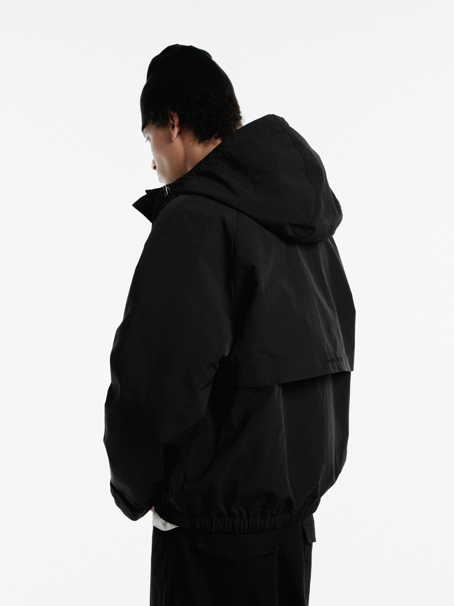 Black ARC Jacket by SWEATS EU featuring a sleek winter design and modern fit, suitable for cold weather.