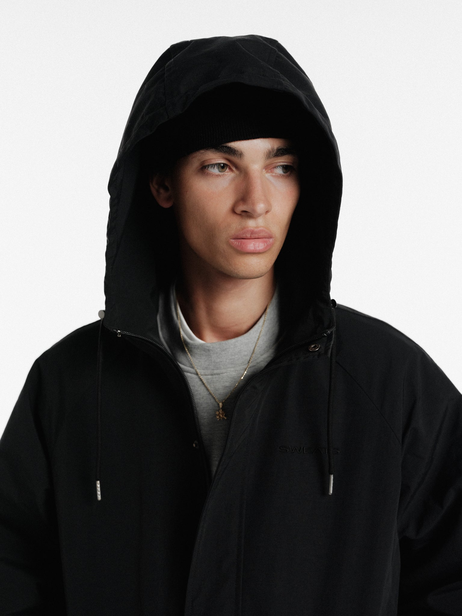 Black ARC Jacket by SWEATS EU featuring a sleek winter design with a comfortable fit and stylish details.