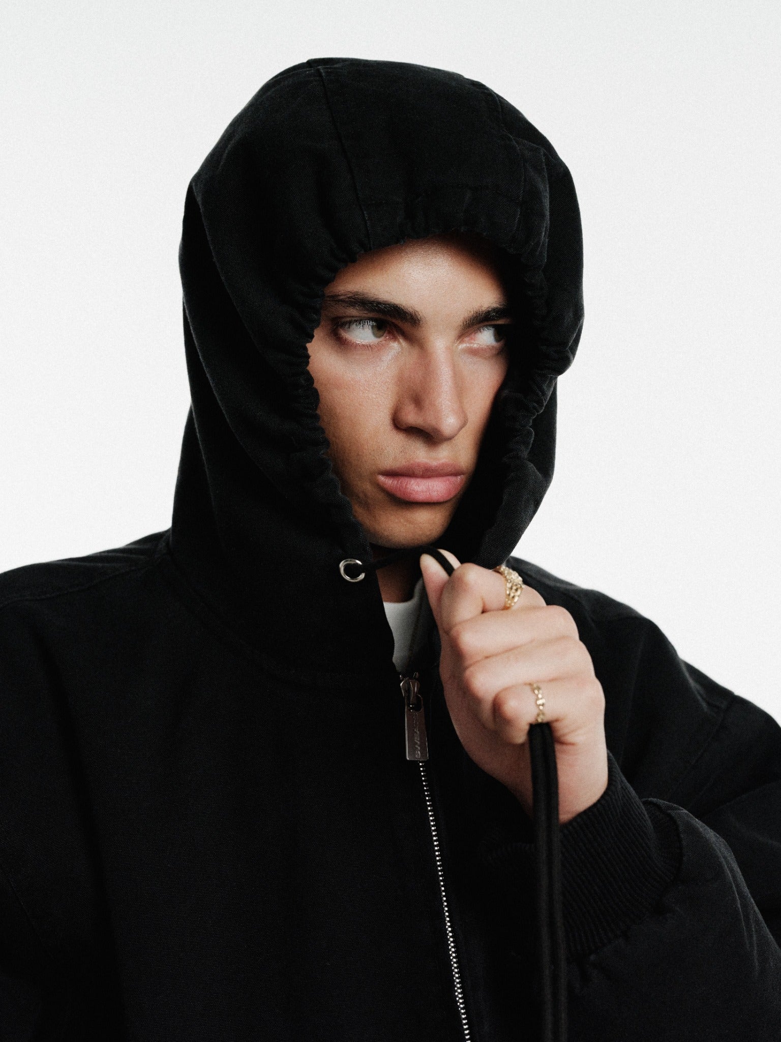 Washed black workwear hoodie from SWEATS EU featuring a comfortable fit and durable fabric for industrial or casual wear.