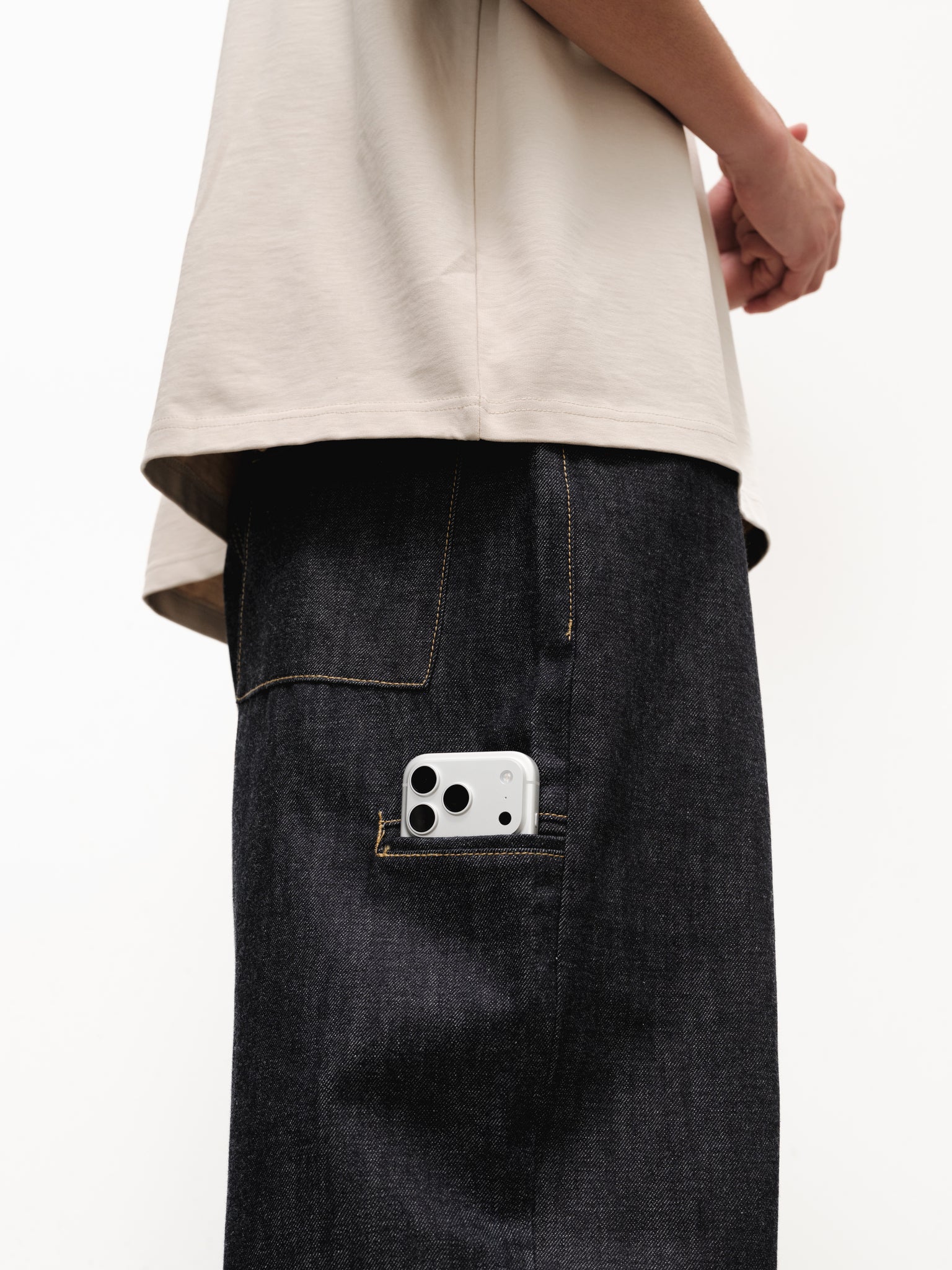 Pair of indigo denim baggy jeans from SWEATS EU featuring a relaxed fit and classic five-pocket design.