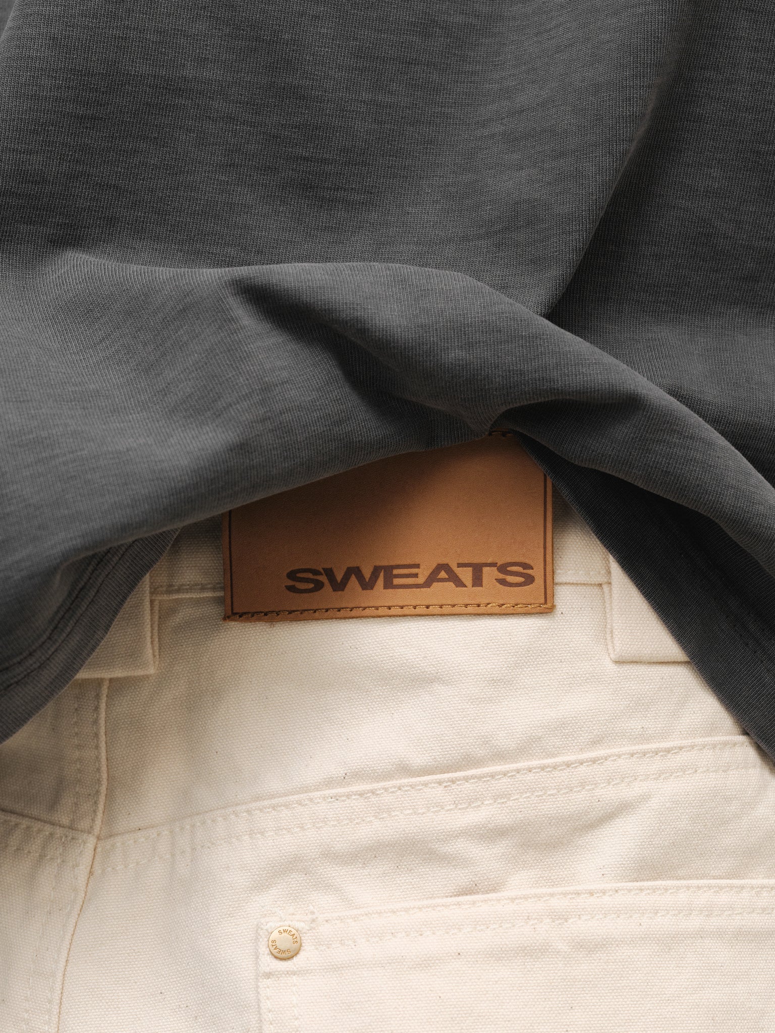Ecru workwear pants by SWEATS EU, full-length view showing durable fabric and comfortable fit.