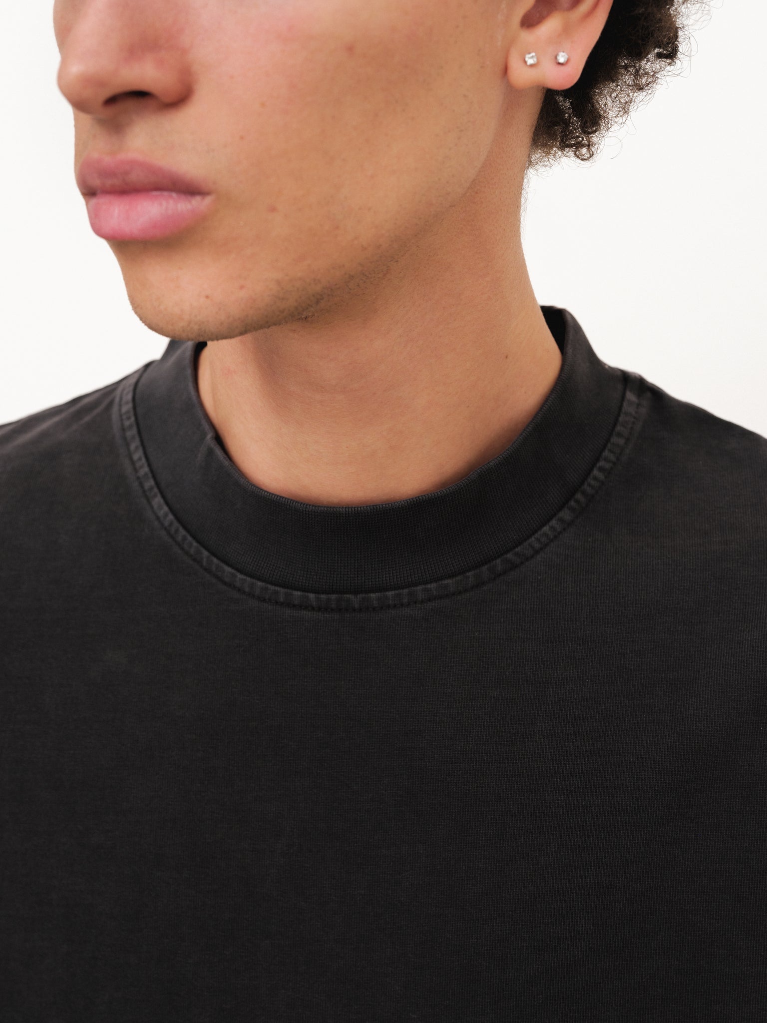 Washed black Signature blank T-shirt by Sweats EU displayed on a full stock shoot mannequin.