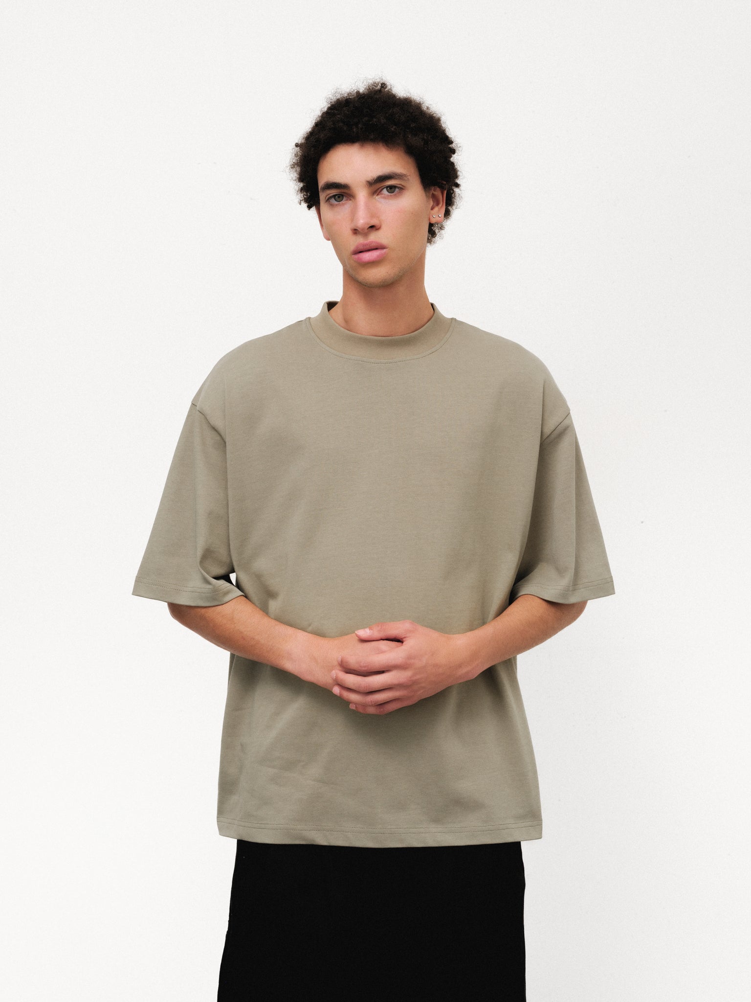 SWEATS EU signature blank sage T-shirt displayed flat, showcasing its simple design and soft fabric texture.