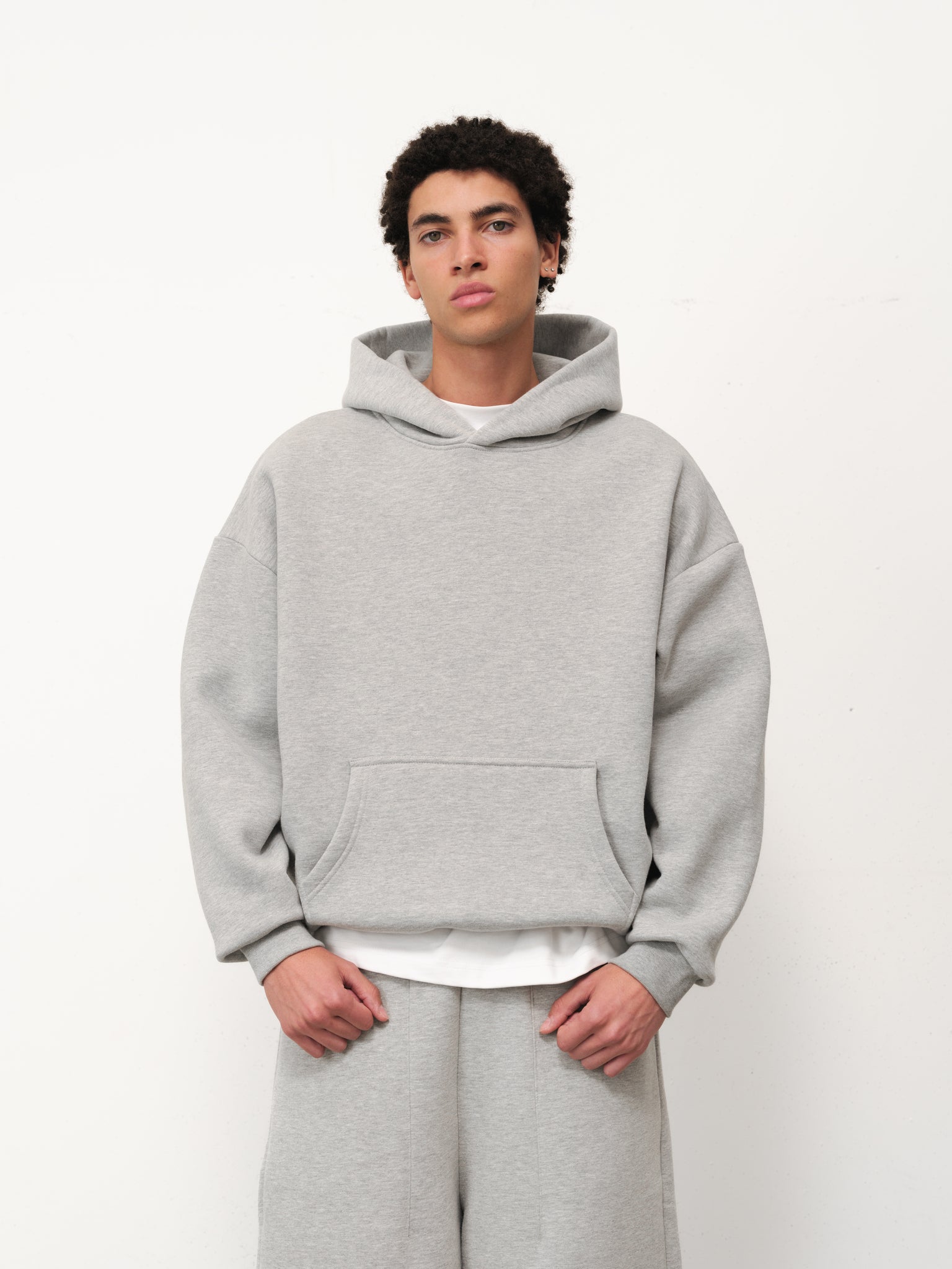 Grey Cozy Hoodie by Sweats EU, showing front view with soft fabric and hood, perfect for comfortable casual wear.