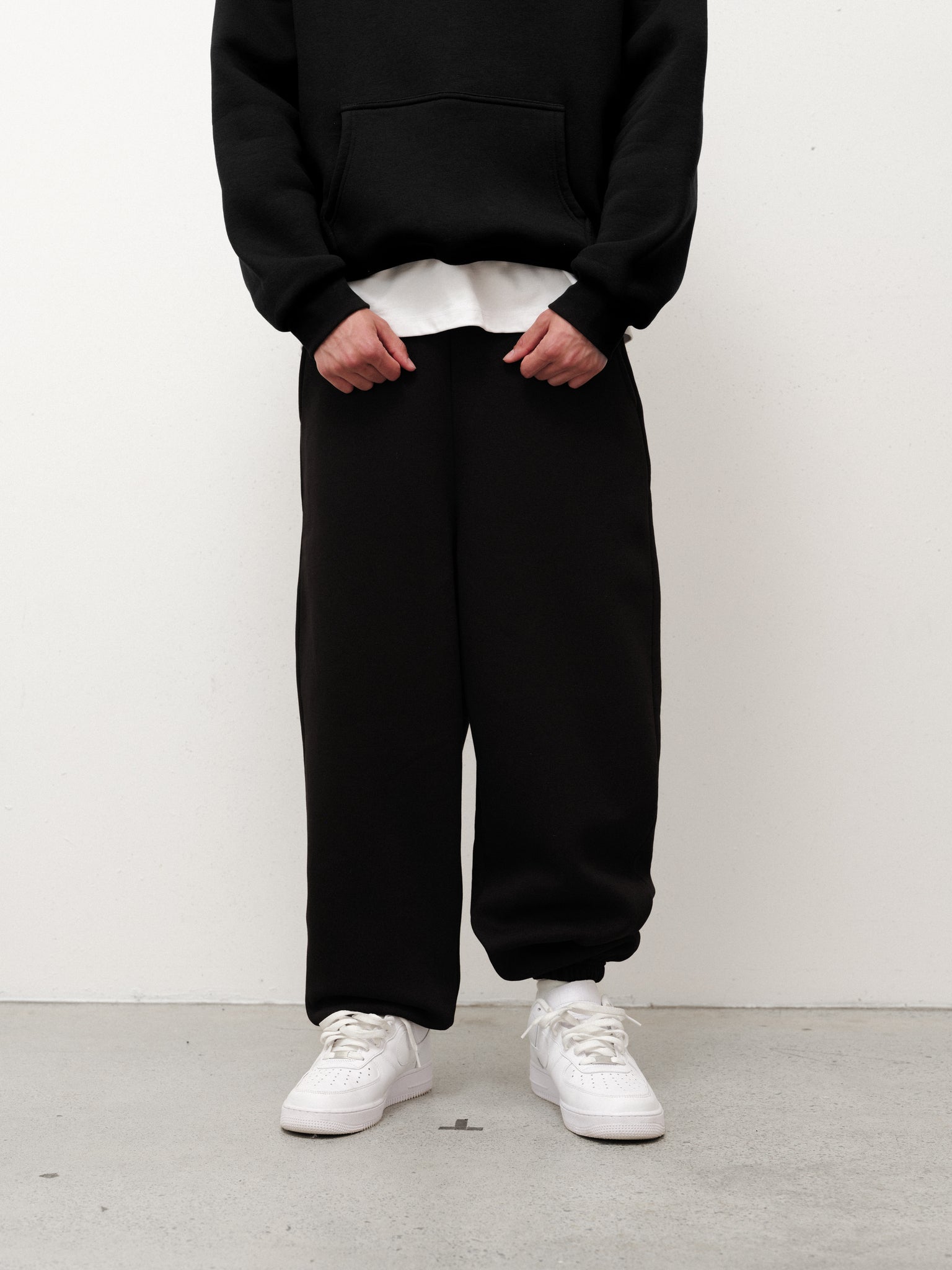 Black Cozy Sweatpant from Sweats EU, showing relaxed fit and soft fabric details in a casual loungewear style.