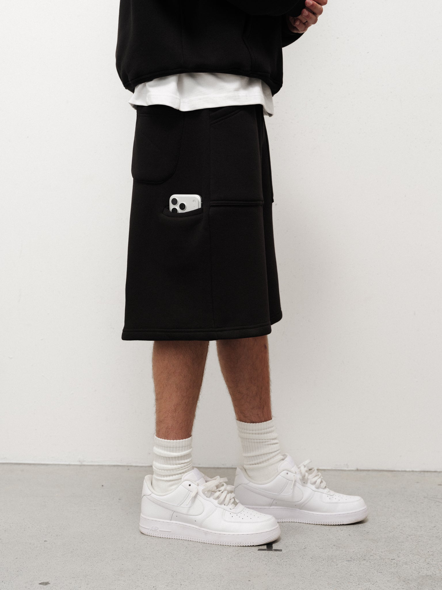 Black Cozy Shorts by Sweats EU, casual loungewear with soft fabric and a relaxed fit, shown on a model.