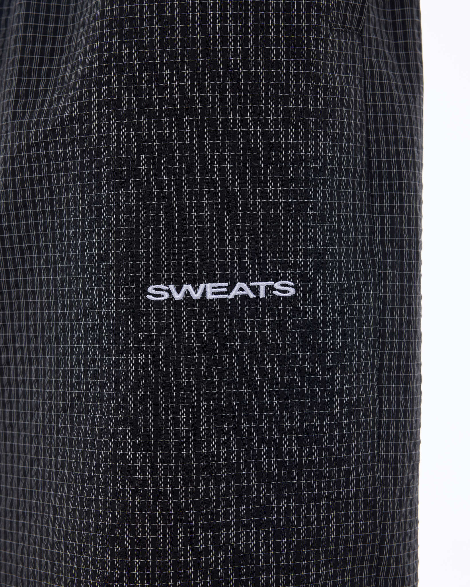 CHECKERED TRACK PANT - BLACK/WHITE - SWEATS EU