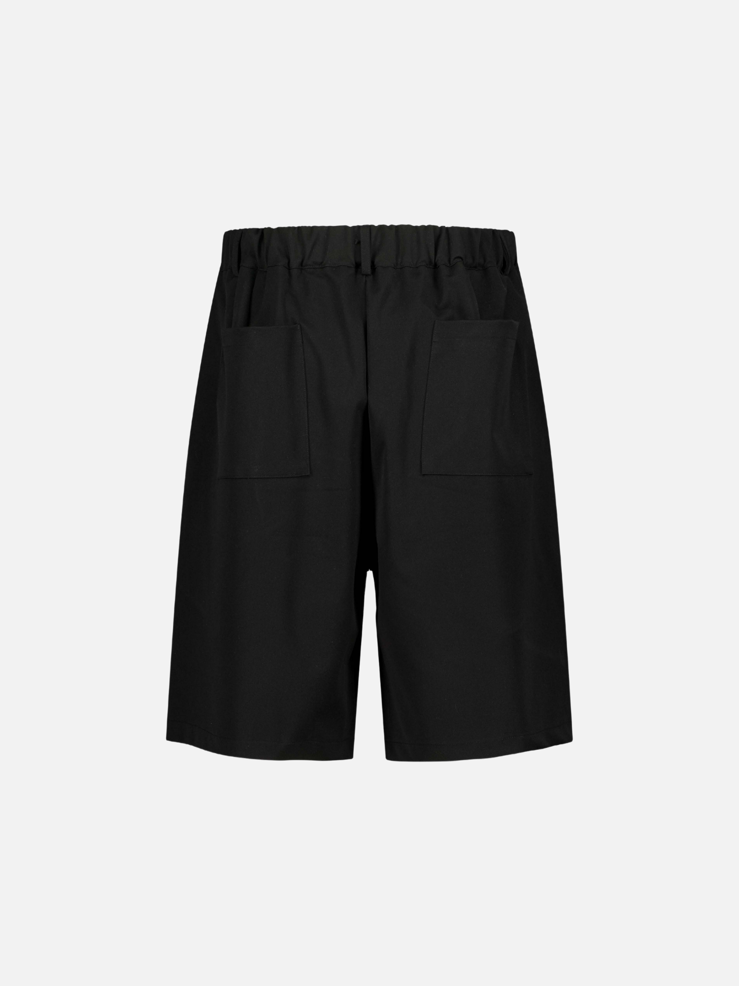 Back view of black pleated shorts by Sweats EU, showcasing the stylish pleats and relaxed fit.