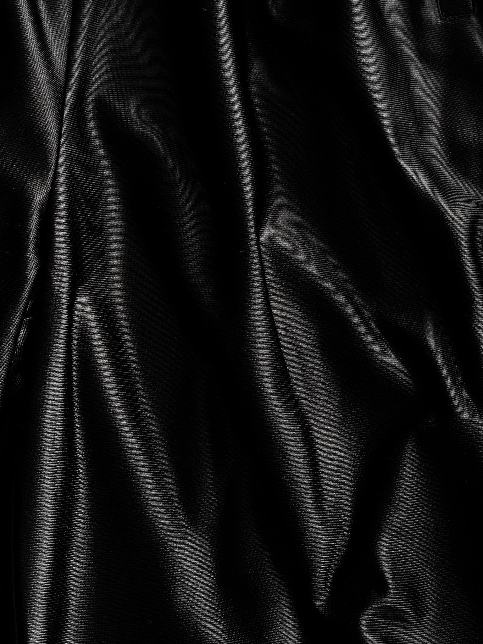 Black League Shorts from SWEATS EU, laid flat showcasing their stylish design and comfortable fit.