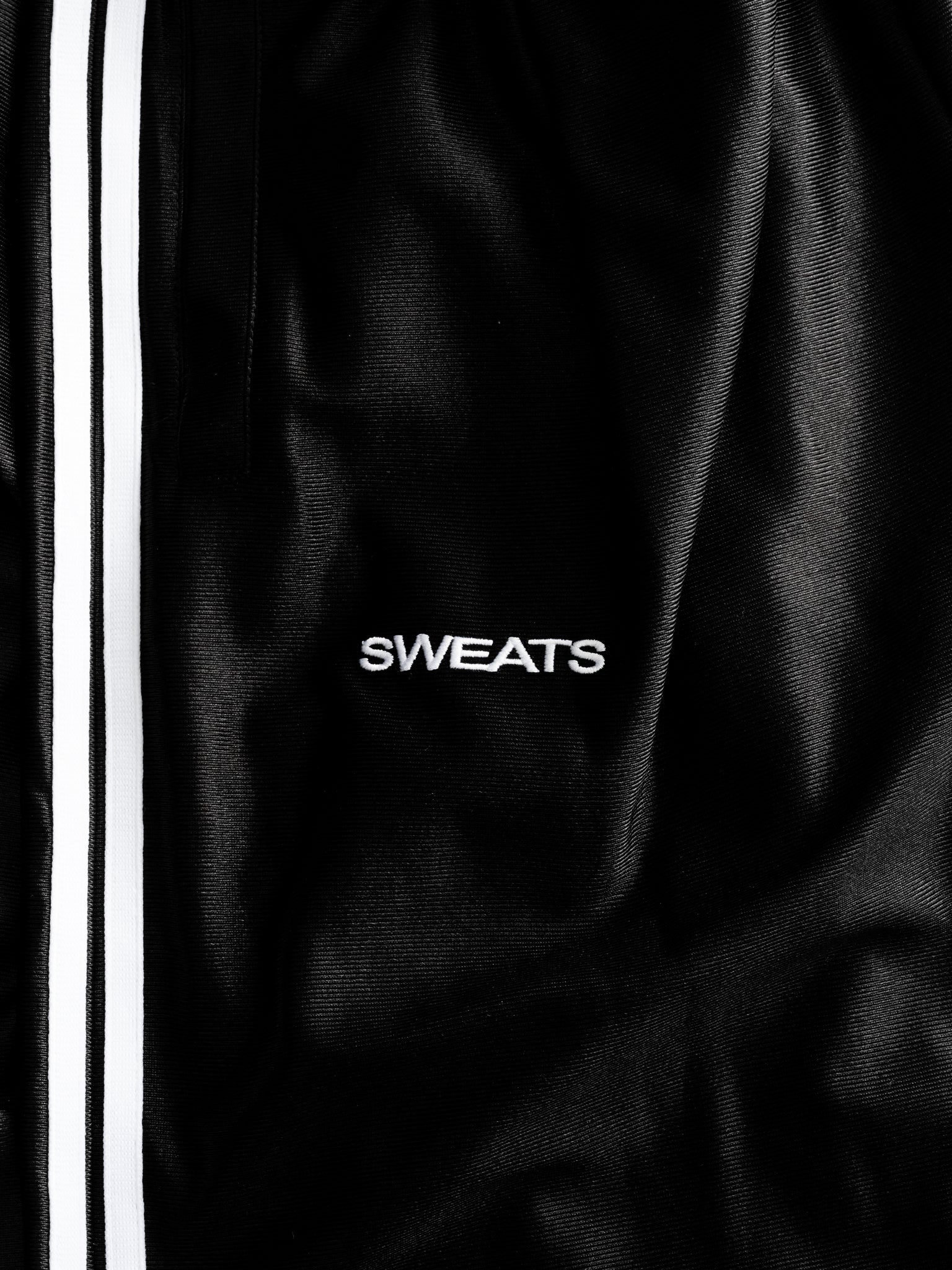 Black League Shorts by Sweats EU laid flat, showcasing the athletic design and comfortable fit of these casual sports shorts.