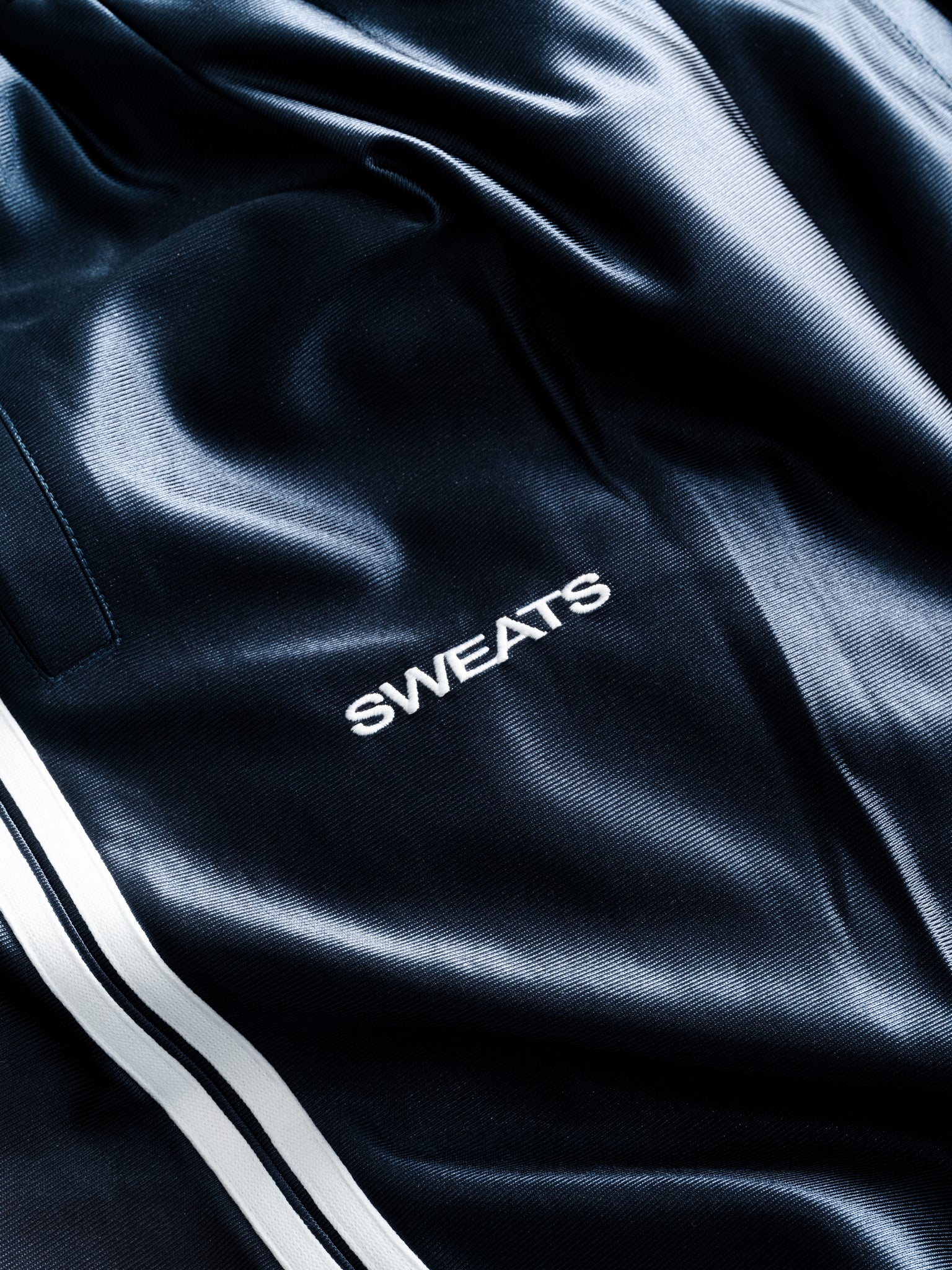 Navy League shorts by SWEATS EU displayed flat with front view, showcasing casual athletic style and comfortable fit.