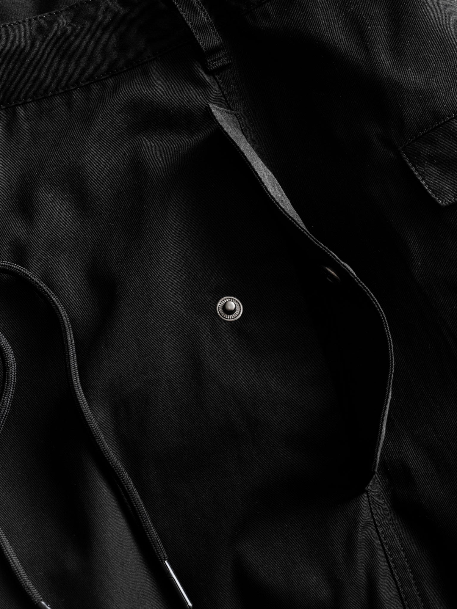 Black V3 Flight Pant by SWEATS EU displayed flat, showcasing athletic joggers with sleek design and comfortable fit.