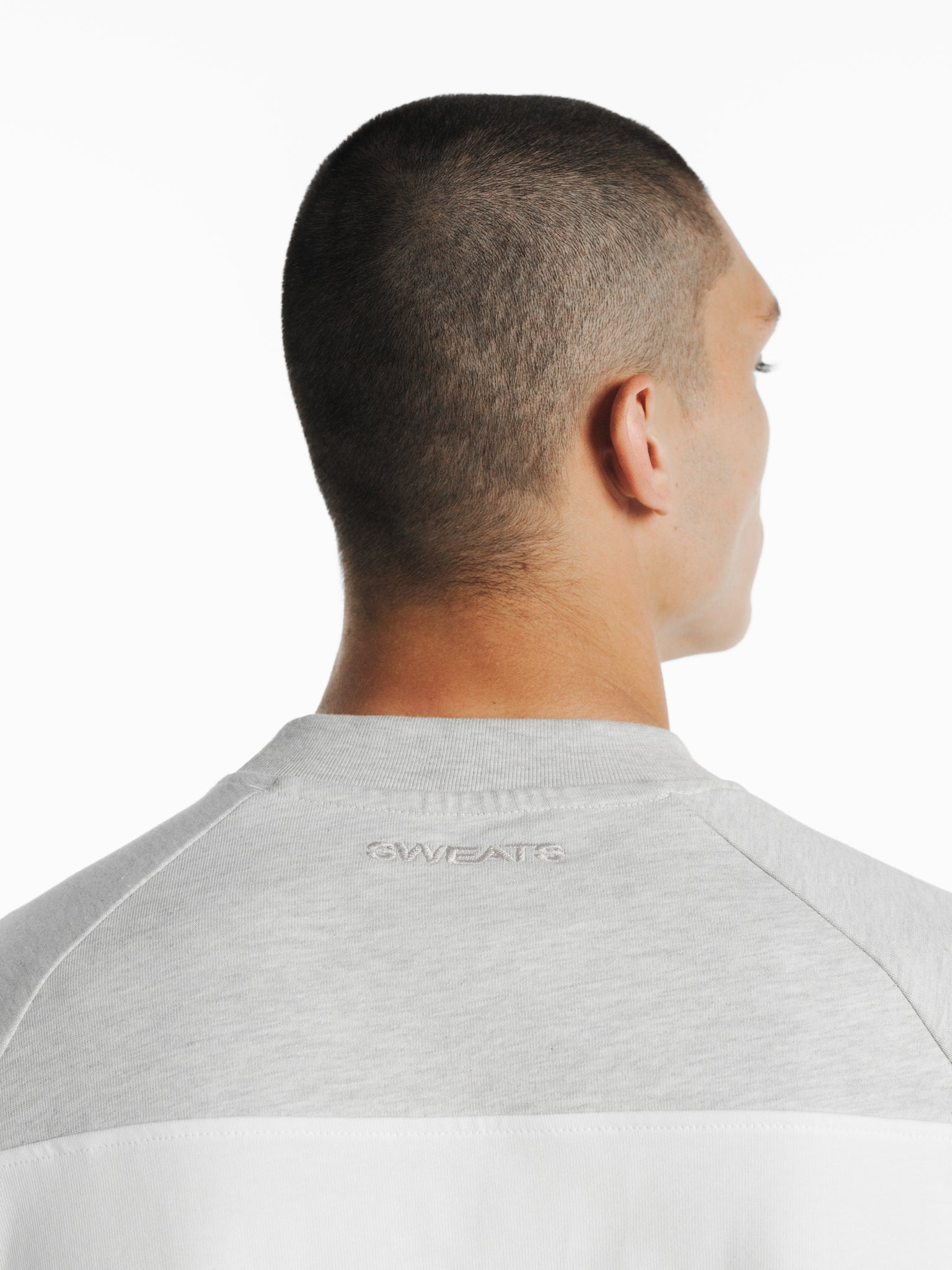 White and Arctic blue raglan short-sleeve T-shirt by SWEATS EU with contrasting sleeves and casual fit.