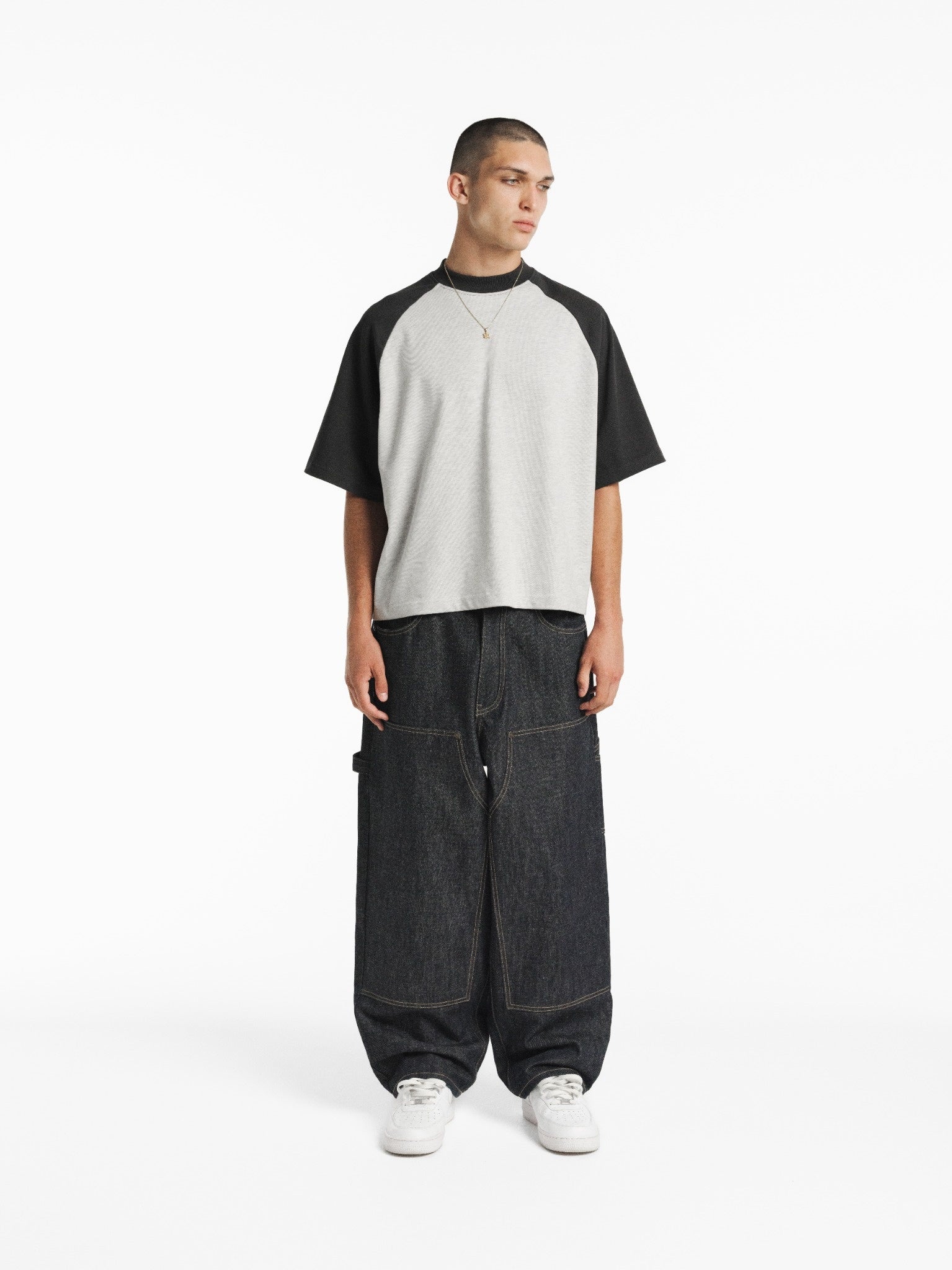 SWEATS EU raglan SS T-shirt in Arcticy and Granite colors, featuring a casual fit with contrasting sleeves and a minimalist design.