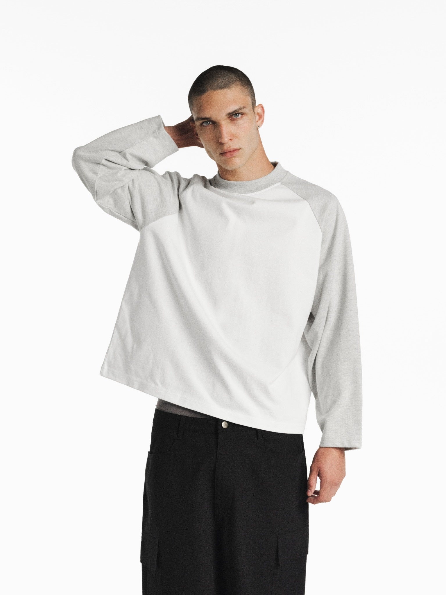 White and Arctic raglan long sleeve t-shirt from SWEATS EU featuring contrasting sleeves and a casual fit.