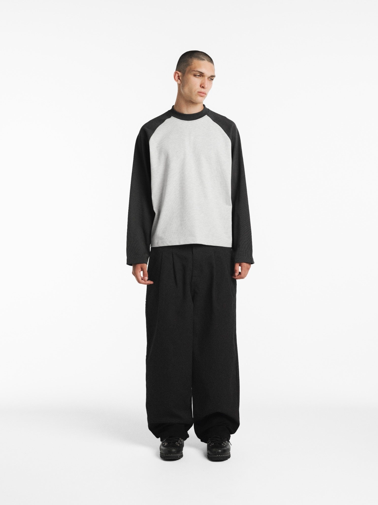Long sleeve raglan T-shirt by SWEATS EU in Arcticy and Granite colors, shown with casual style and fabric details.