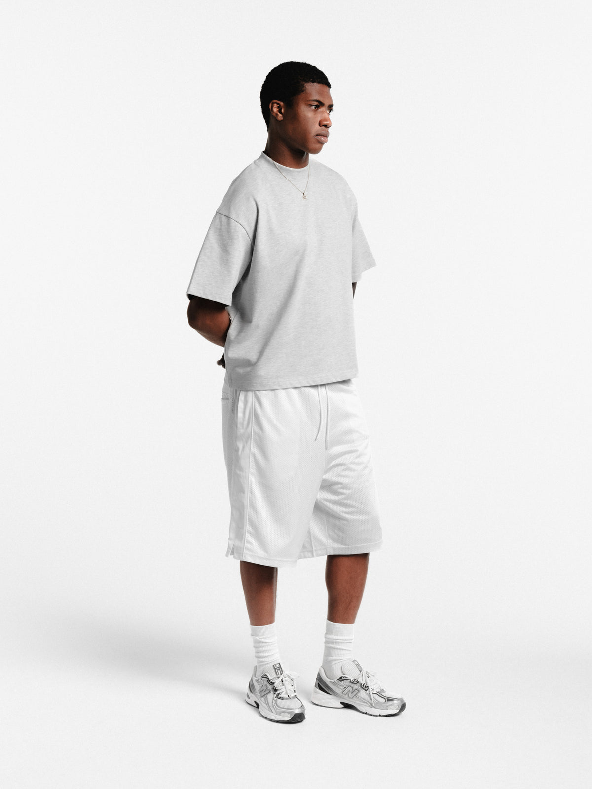 White mesh shorts by Sweats EU featuring lightweight fabric and casual fit, ideal for active or relaxed wear.