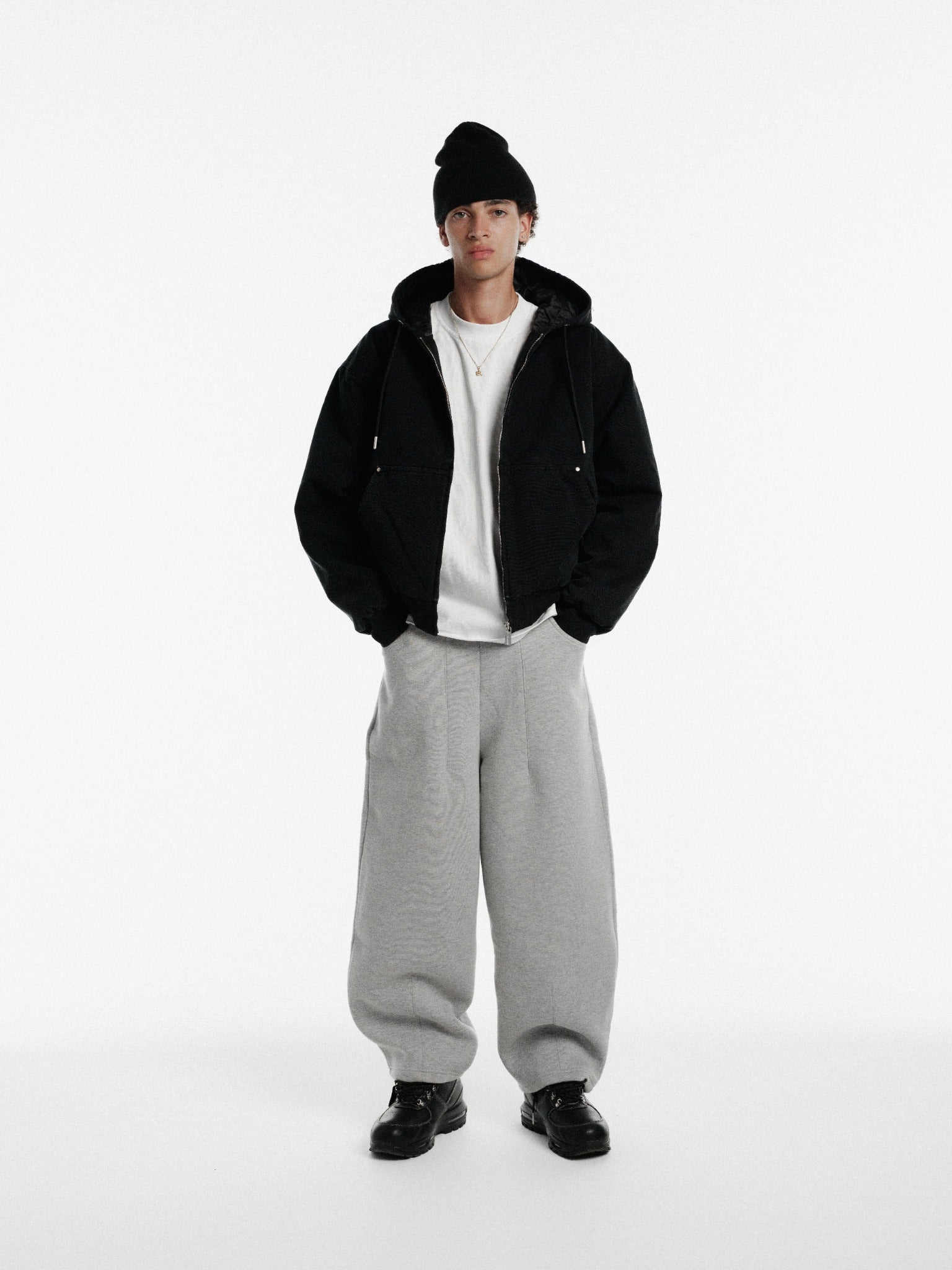 Washed black workwear hoodie by SWEATS EU featuring a comfortable fit and durable fabric, ideal for casual and workwear styles.
