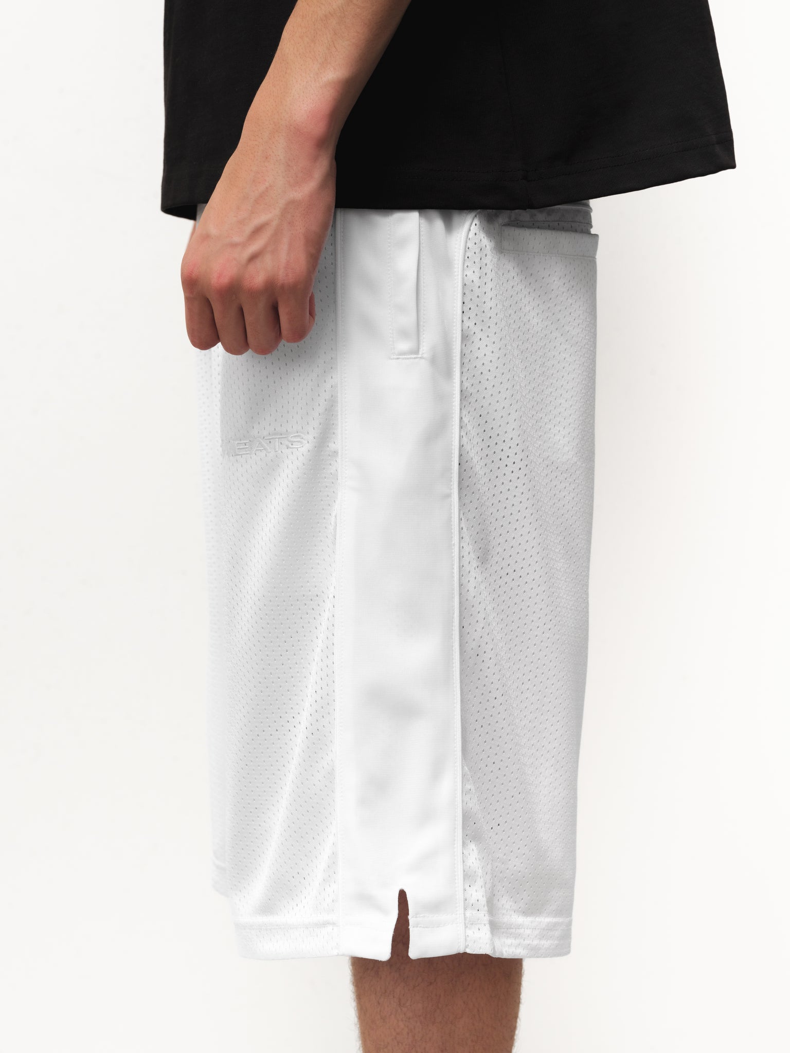 White mesh shorts from Sweats EU, featuring a lightweight design and breathable fabric for comfort and style.