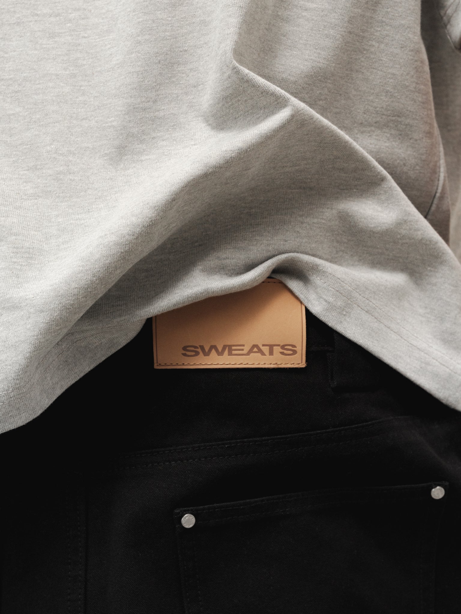 Marle grey Signature Blank T-shirt by Sweats EU shown on a model, featuring a classic fit and soft cotton fabric.