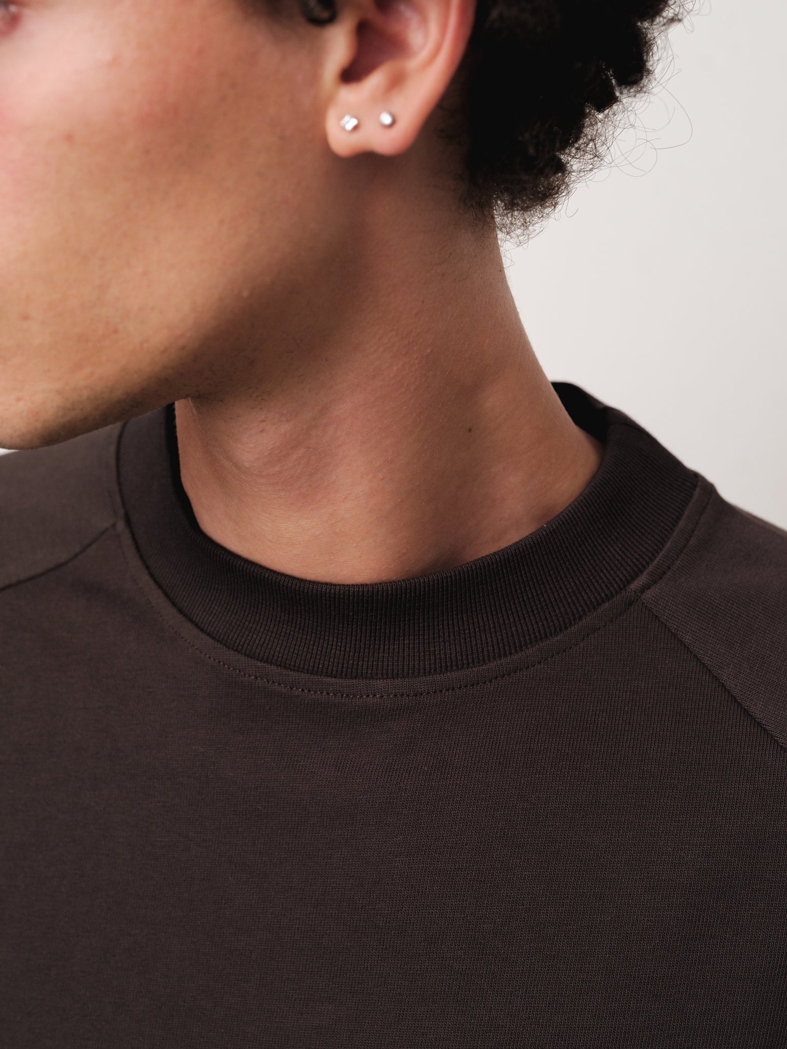 Long sleeve coffee-colored T-shirt by Sweats EU, shown flat with visible fabric texture and simple crew neckline.