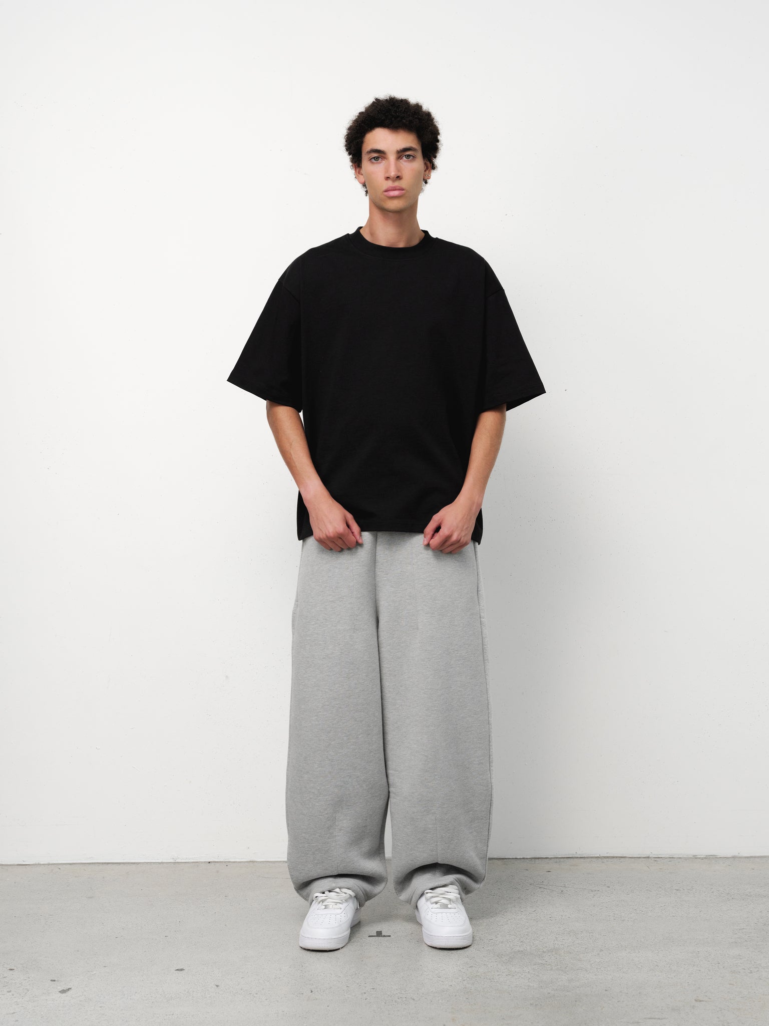 Black Signature Blank T-shirt by Sweats EU, front view showing classic crew neck and smooth cotton fabric.