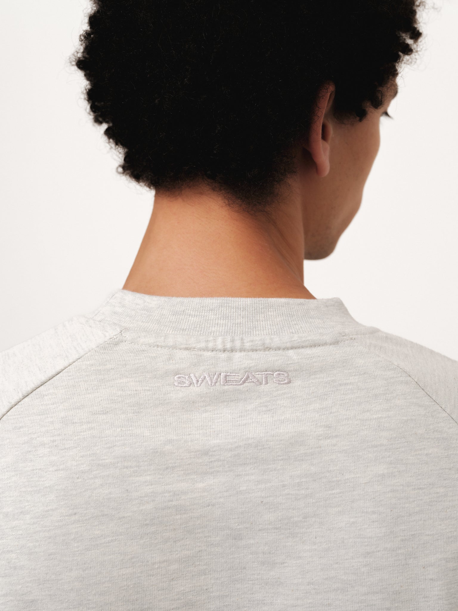 Long sleeve T-shirt by SWEATS EU in black, featuring a comfortable fit and simple design, ideal for casual wear.