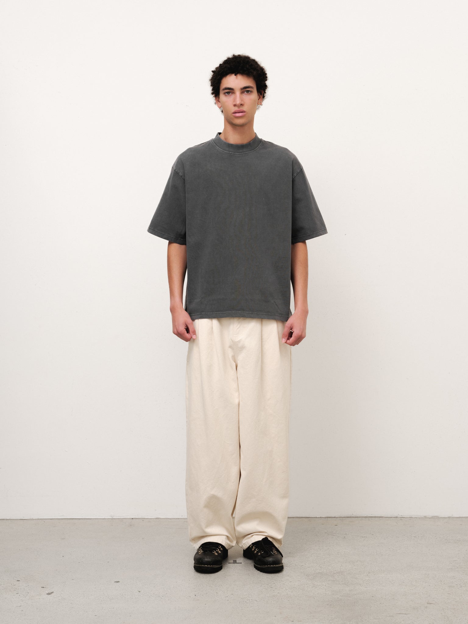 Ecru workwear pants from SWEATS EU, full-length with practical design and sturdy fabric, suitable for work environments.