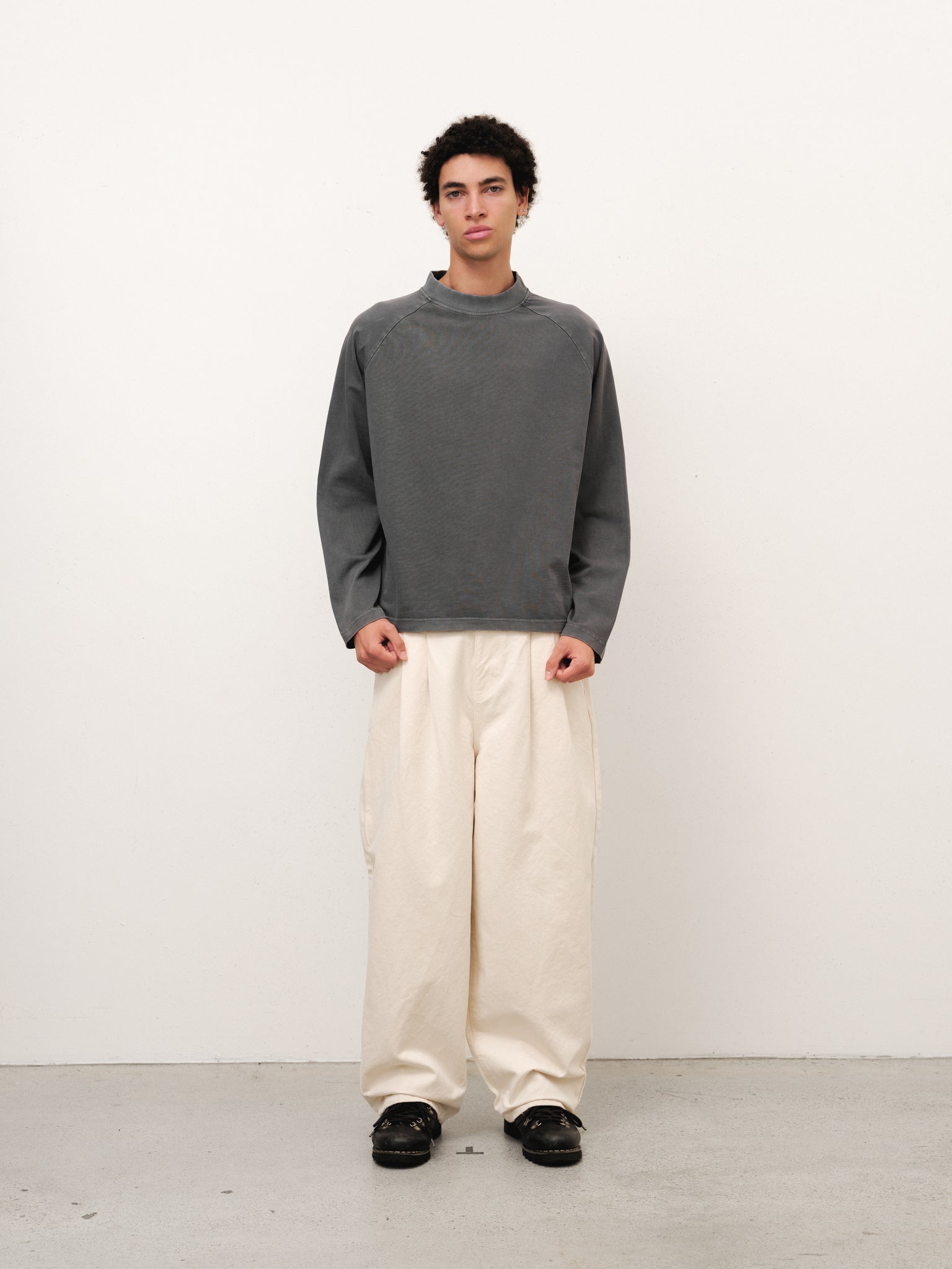 Washed grey long sleeve T-shirt by Sweats EU, displayed flat with soft fabric texture and classic crew neck design.
