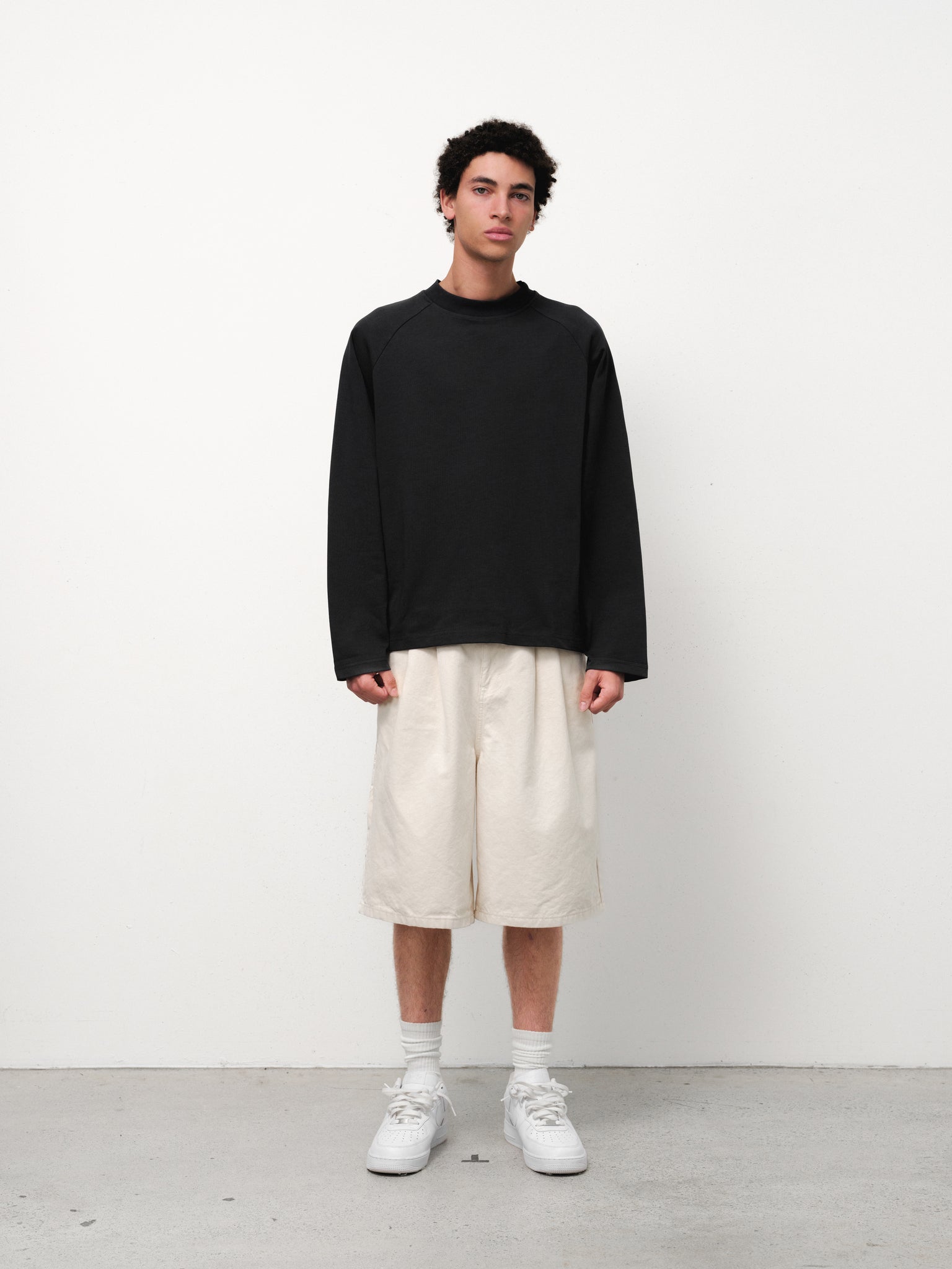 Ecru workwear shorts by SWEATS EU, featuring durable fabric and a comfortable fit, displayed in a full-length shot.