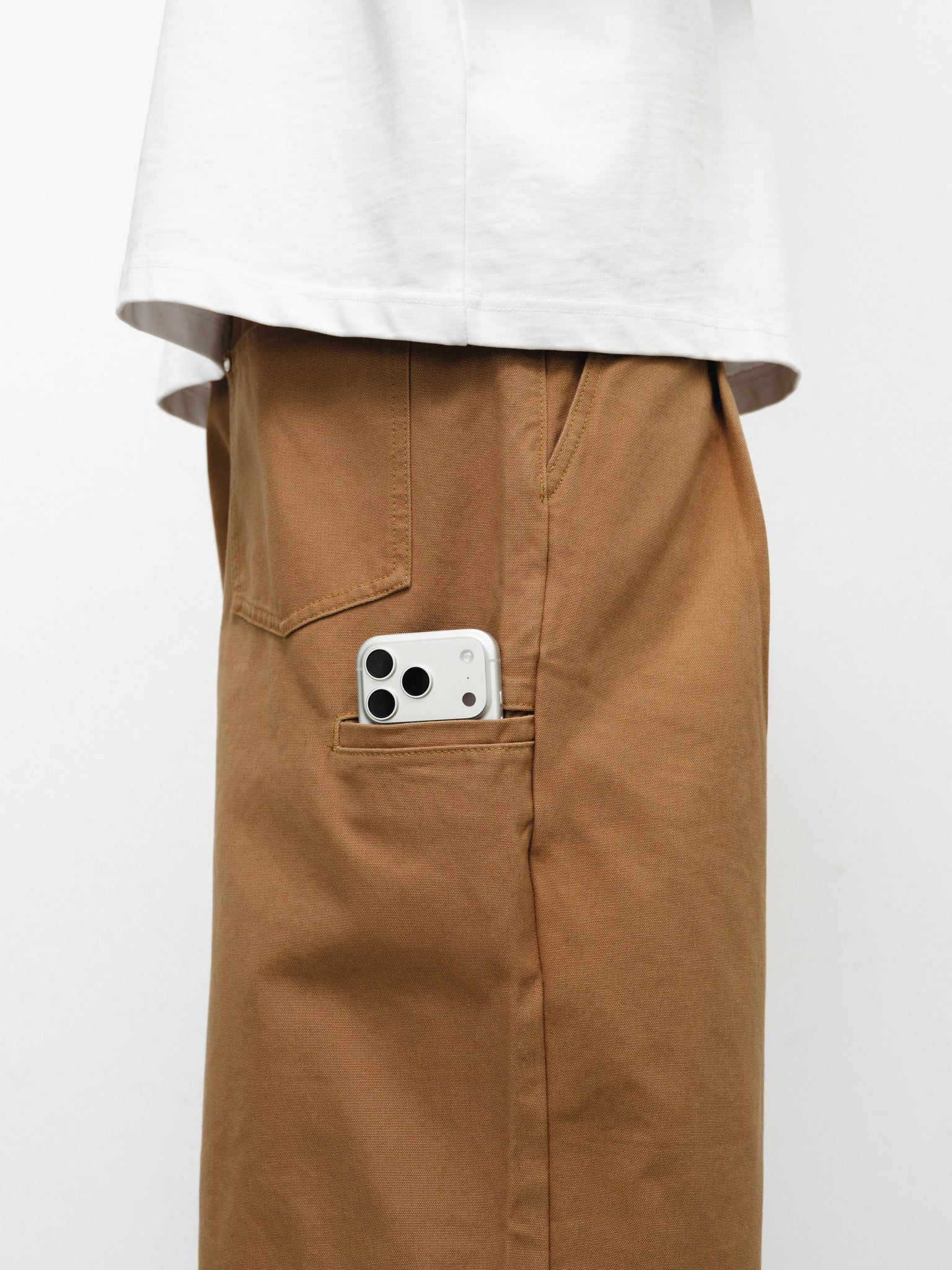 Tan workwear pants by SWEATS EU, full-length view showcasing durable fabric and practical design for work attire.