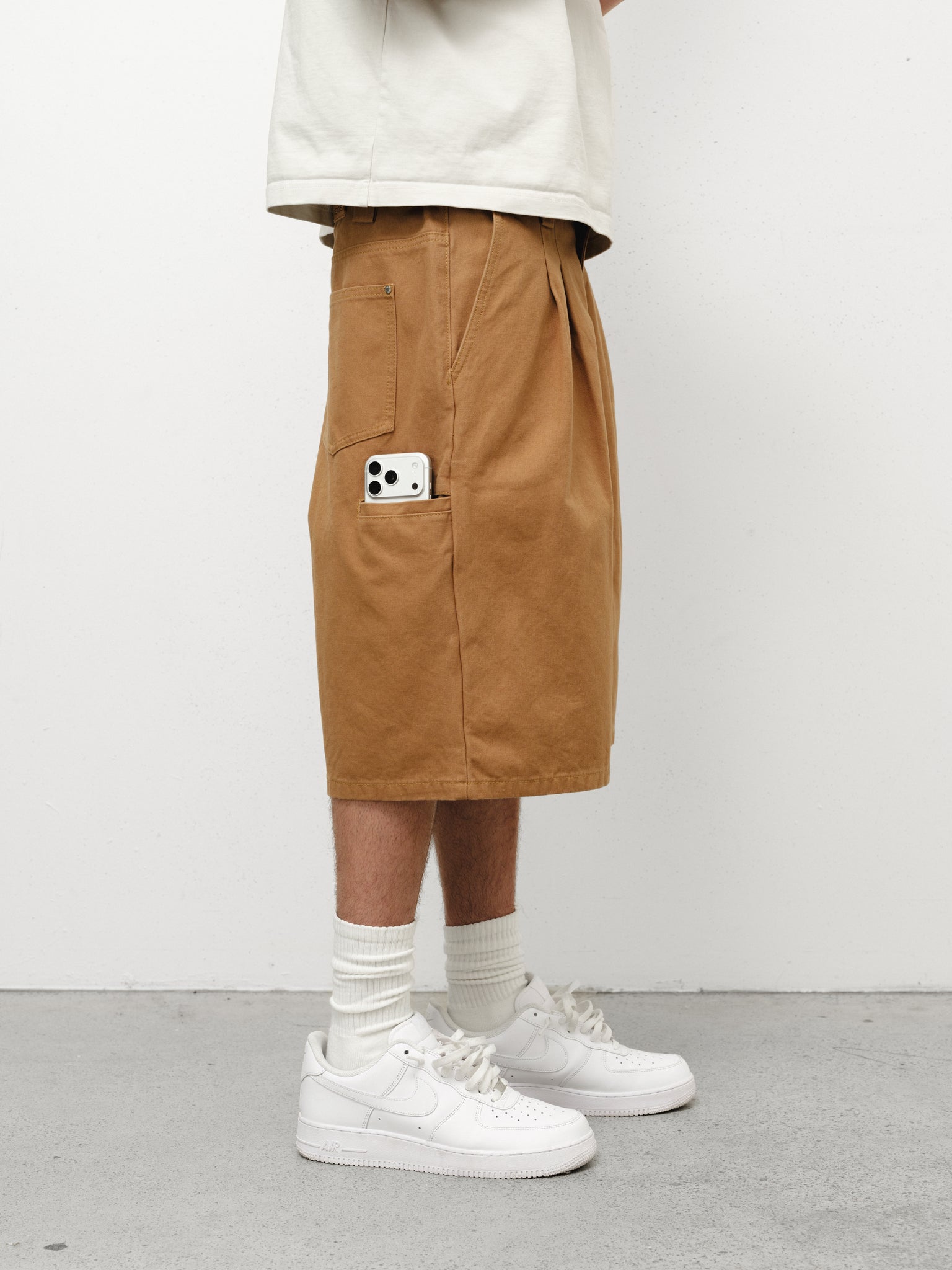 Tan workwear shorts by SWEATS EU, featuring durable fabric and a comfortable fit for industrial or casual wear.