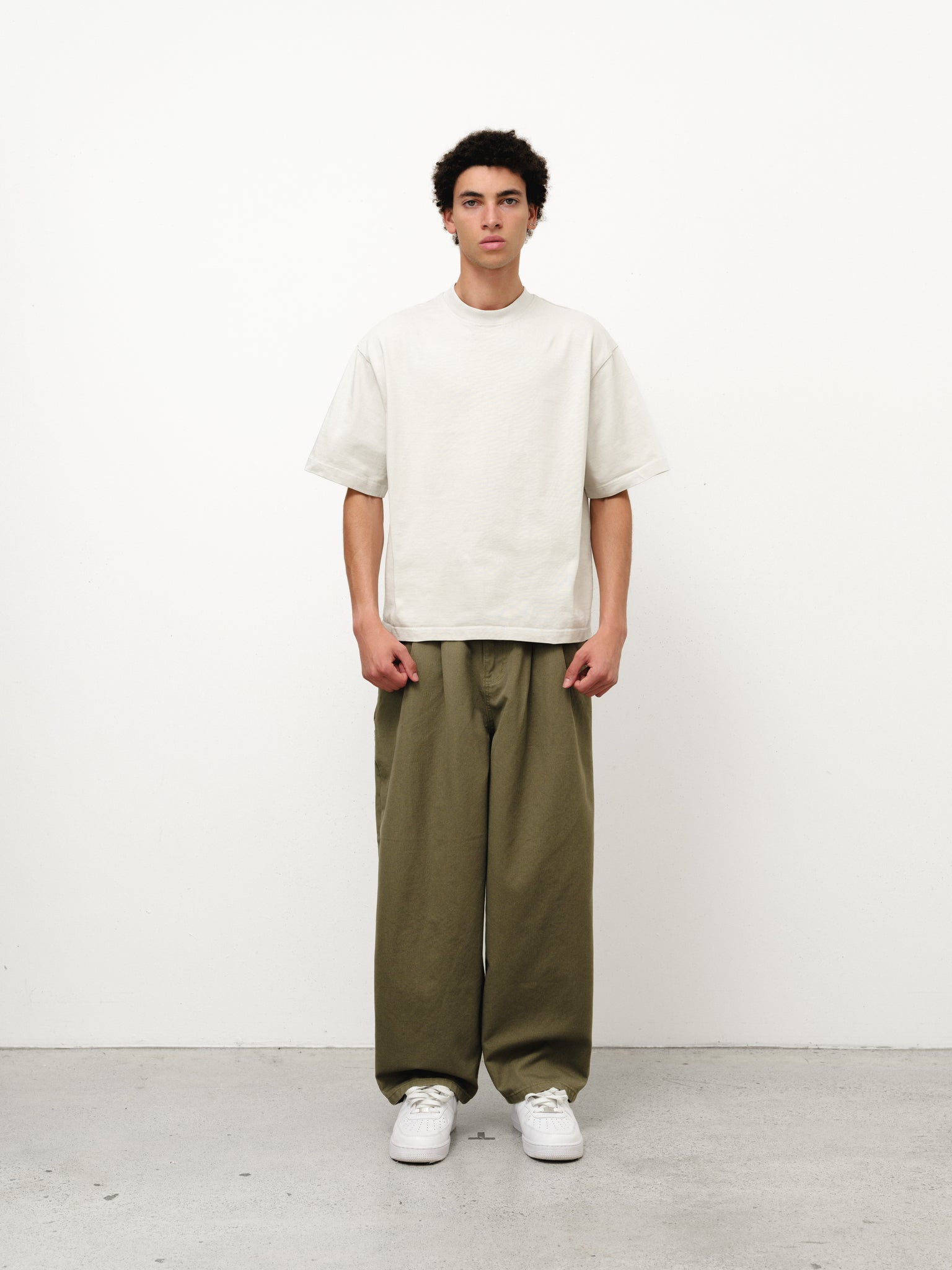 Olive workwear pants by SWEATS EU, full-length view showing durable fabric and practical design for industrial or outdoor use.