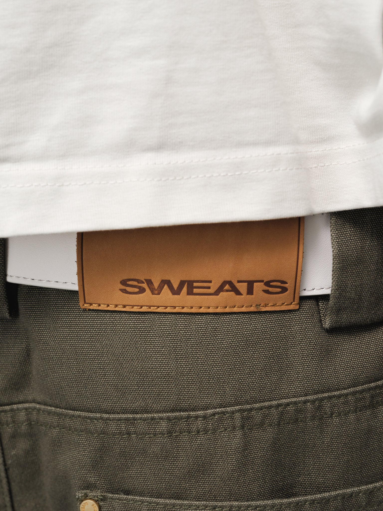 Olive workwear pants by SWEATS EU, full-length view showing durable fabric and functional design for industrial or casual wear.